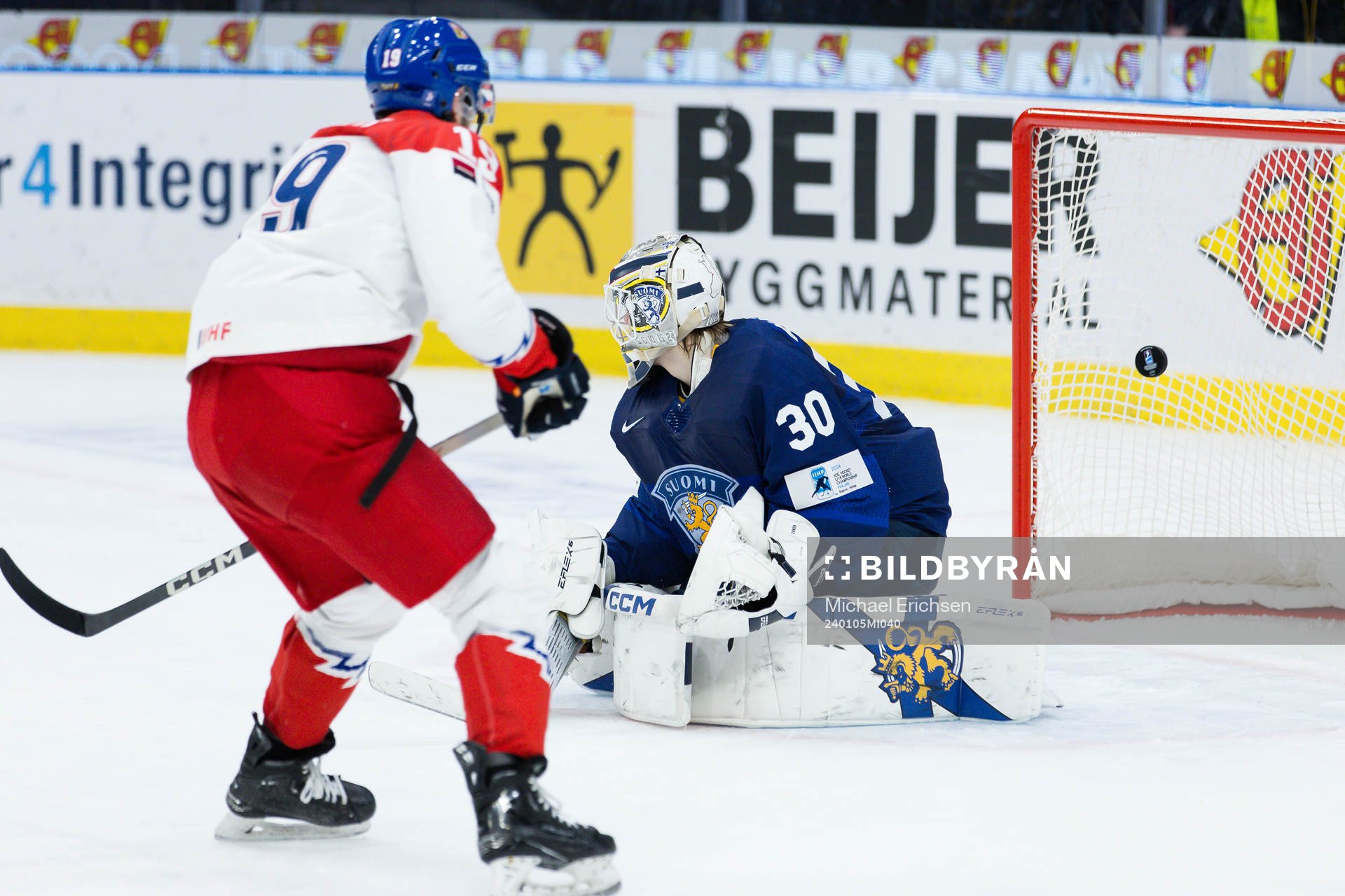 Ondrej Becher of Czech Republic Goaltender Niklas Kokko of