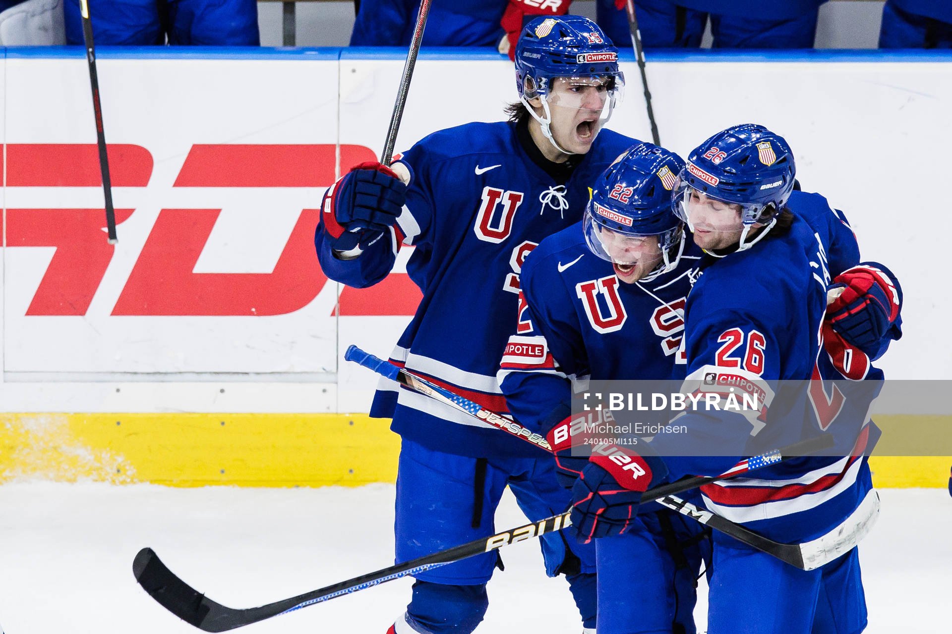 Cutter Gauthier and Seamus Casey celebrate with Isaac Howard
