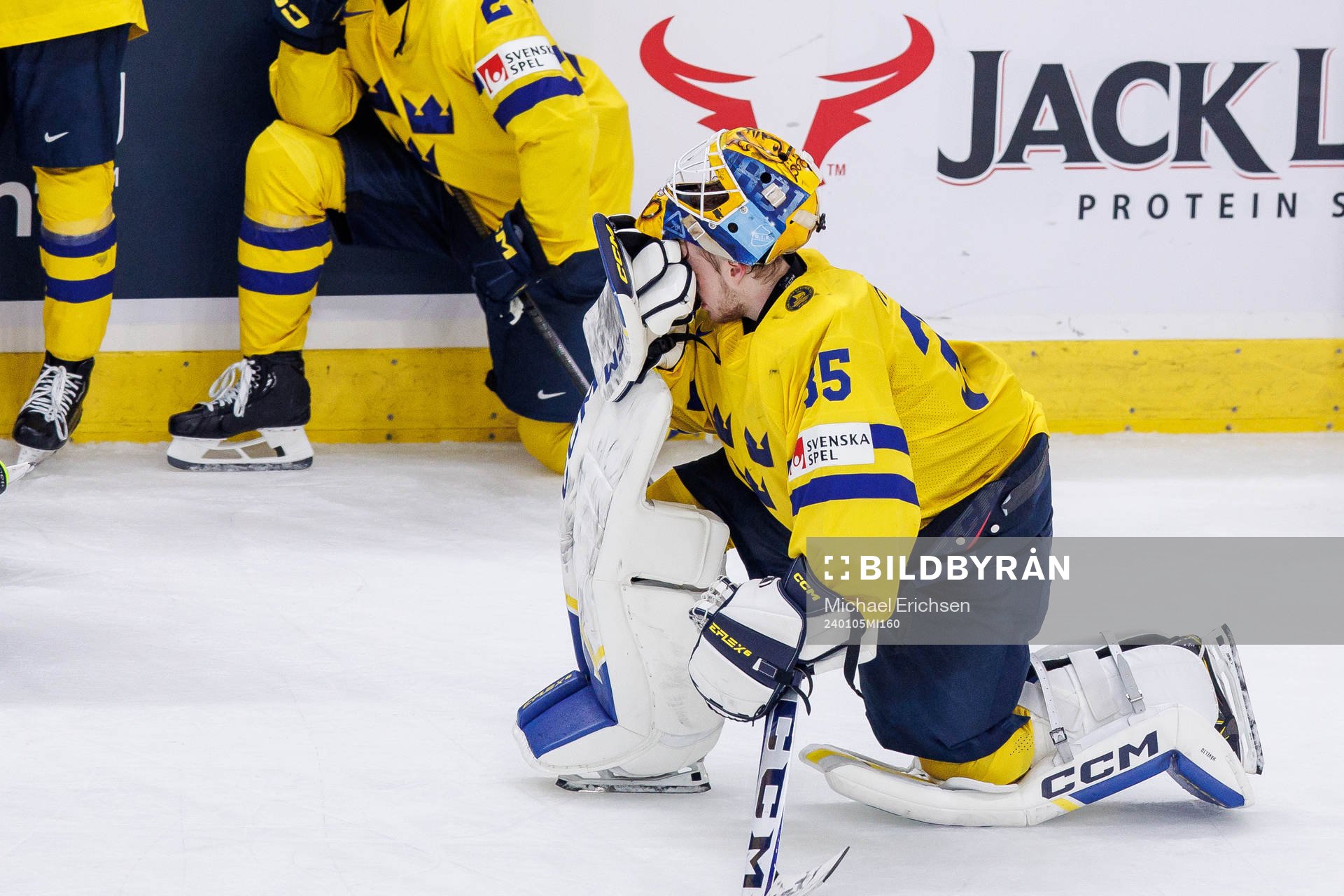 Goaltender Hugo Hävelid of Sweden looks dejected