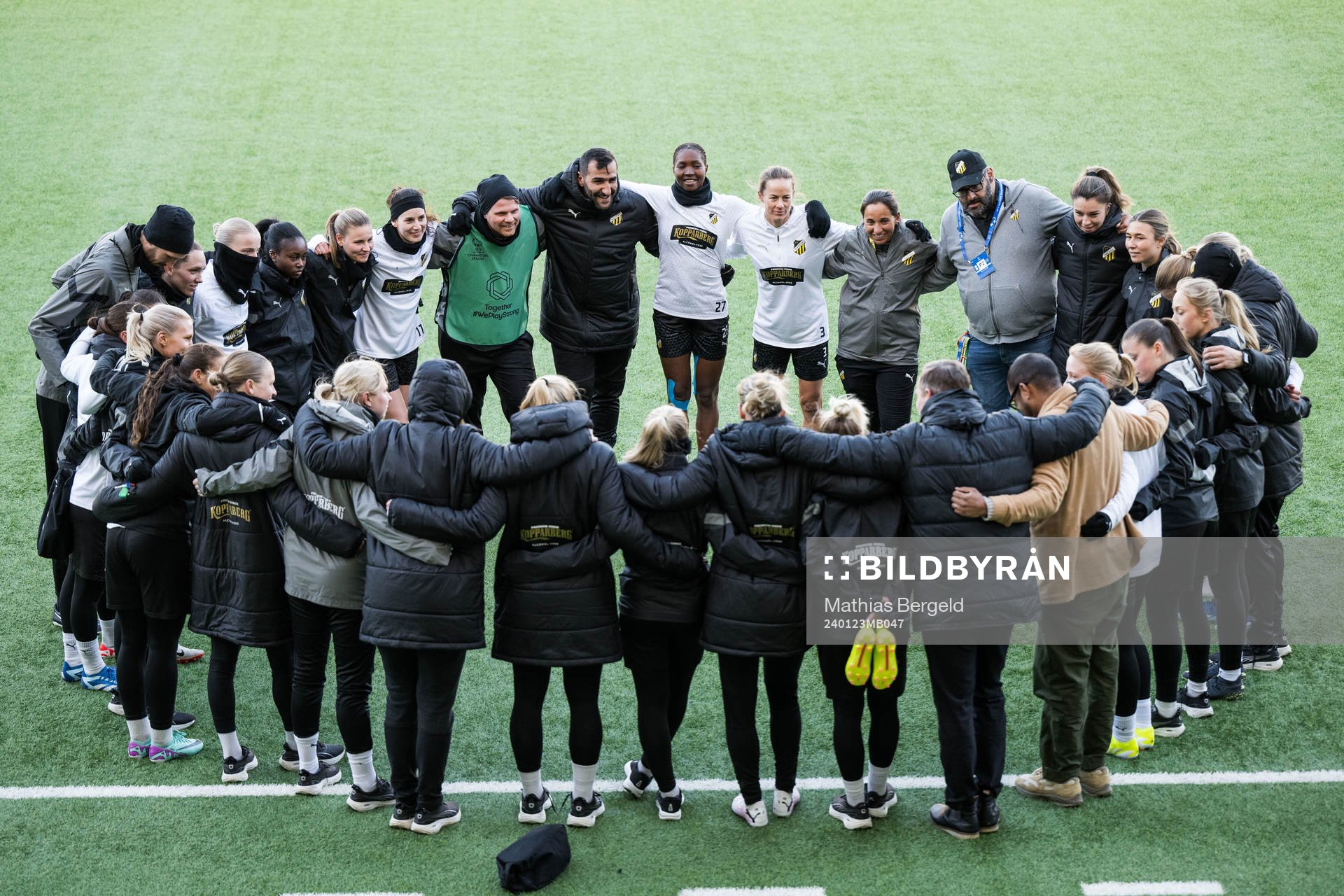 The team gather