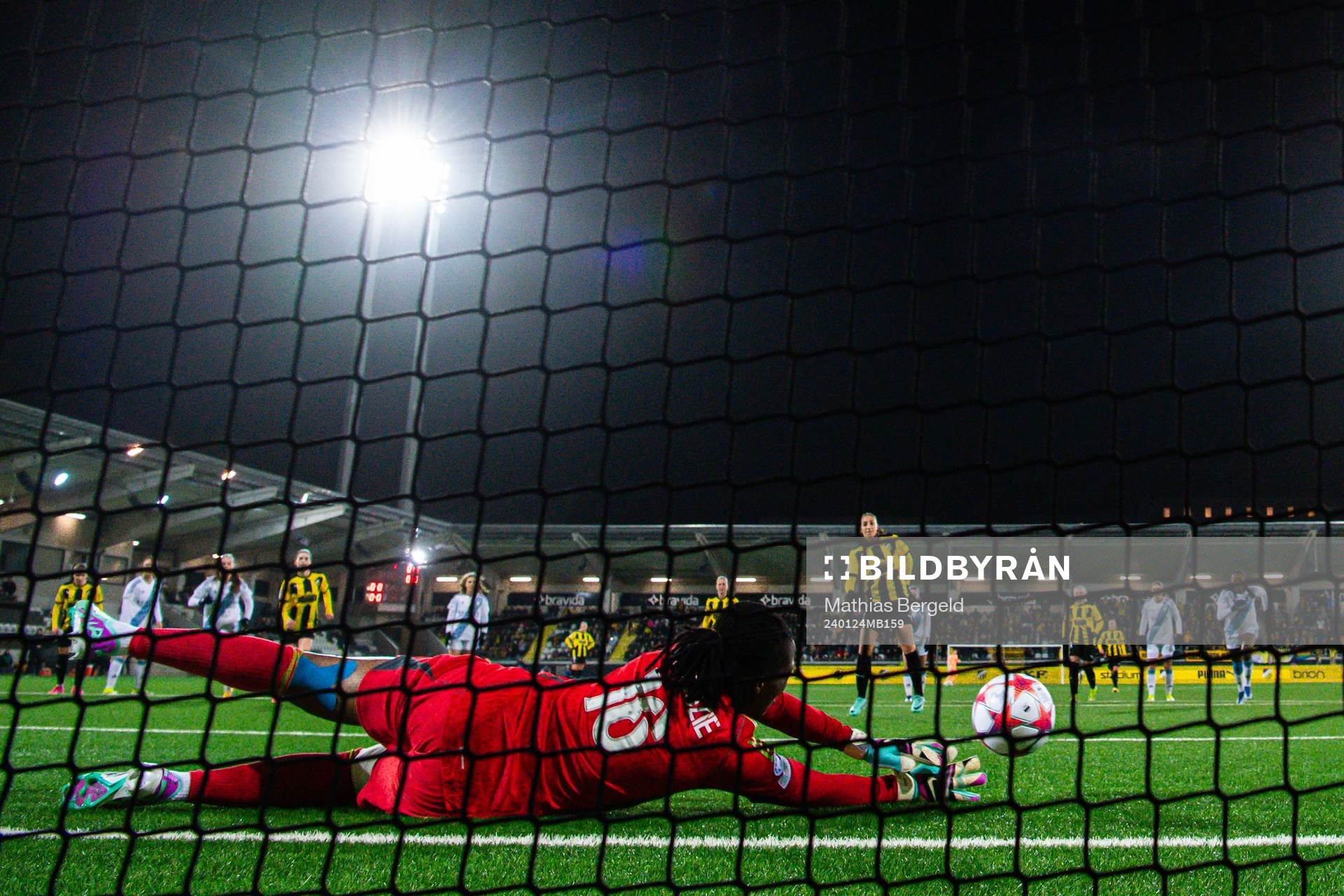 Chiamaka Nnadozie of Paris FC saves a penalty kick from