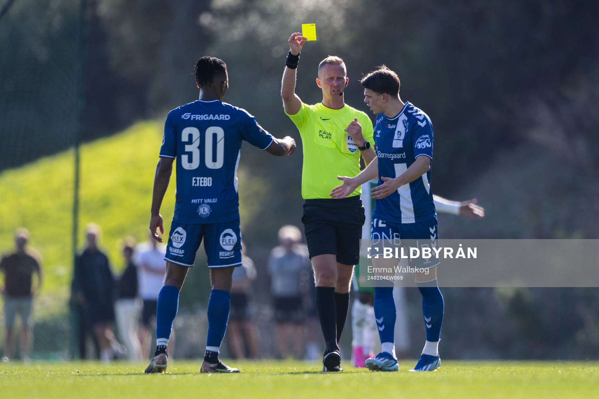 Sander Christiansen of Sarpsborg 08 receives a yellow card