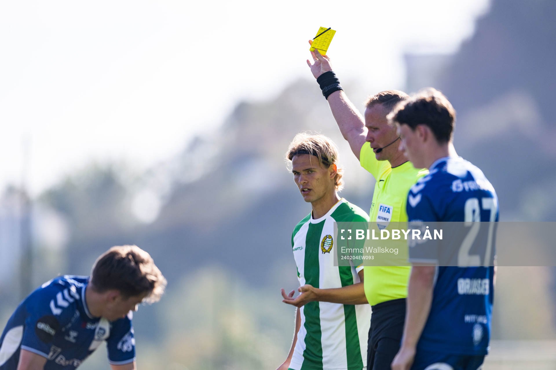 Markus Karlsson of Hammarby receives a yellow card
