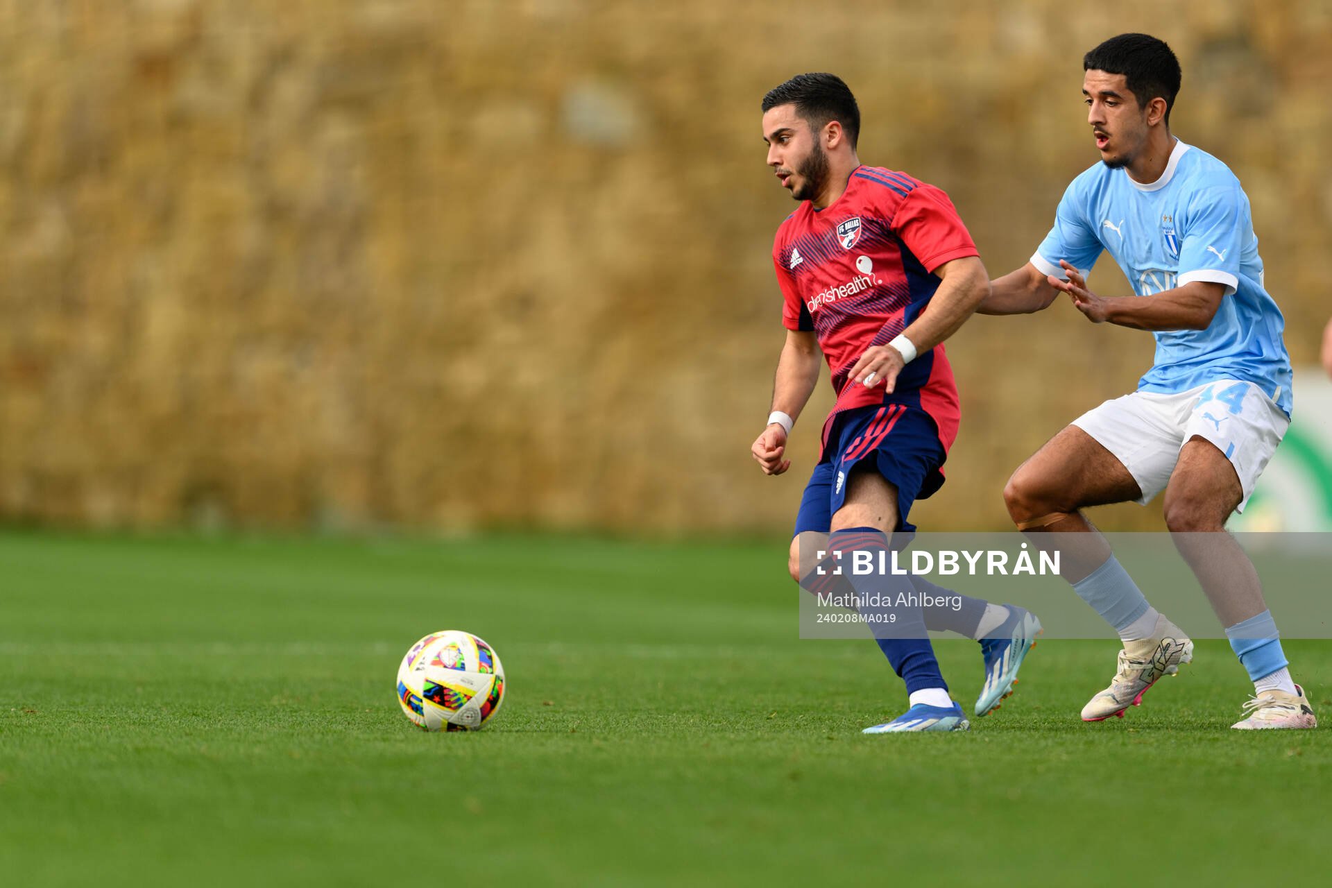Mads Westergren of Dallas and Zakaria Loukili of Malmö FF