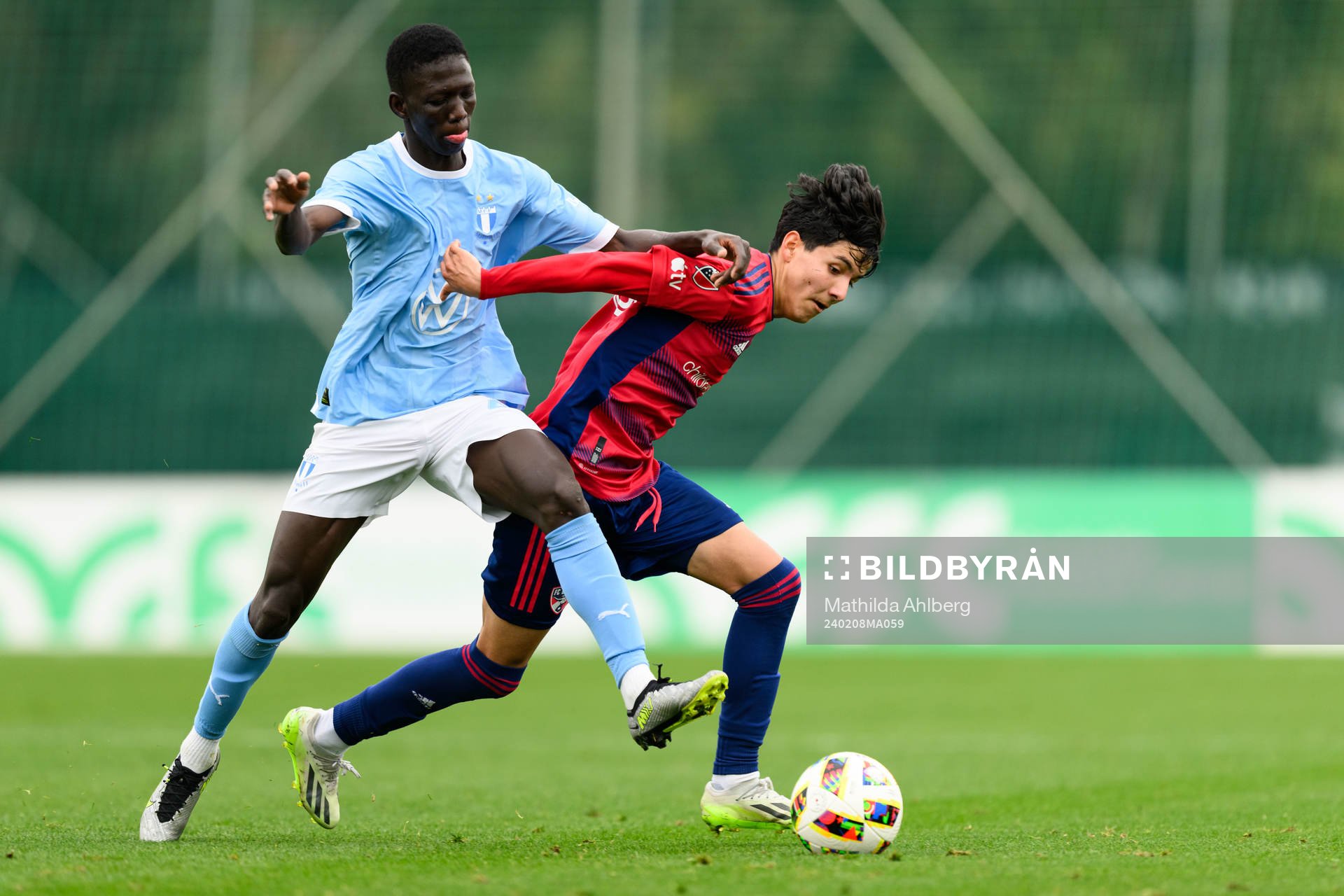 Mamadou Diagne of Malmö FF and Alejandro Urzua of Dallas