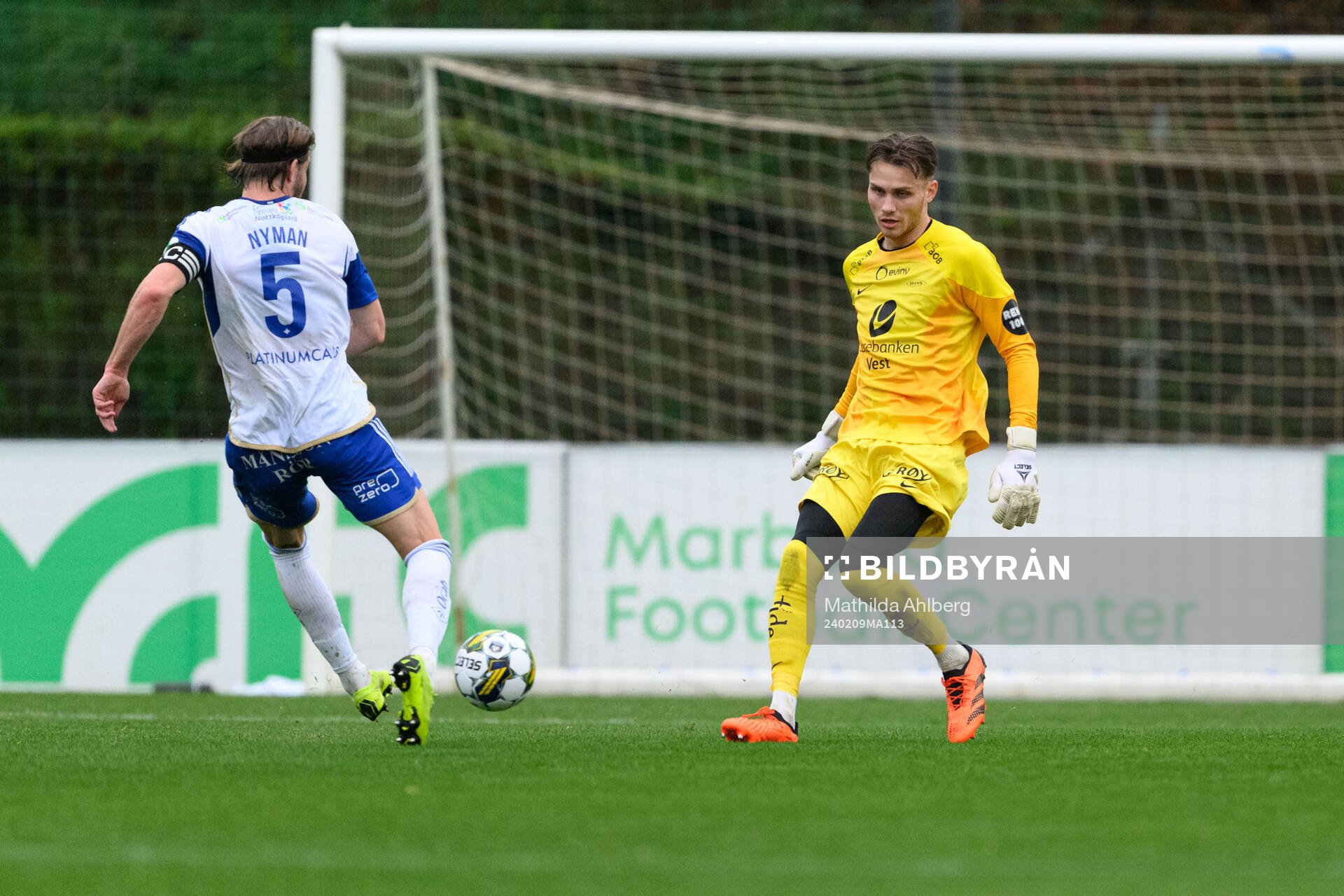 Christoffer Nyman of IFK Norrköping and Goalkeeper Martin