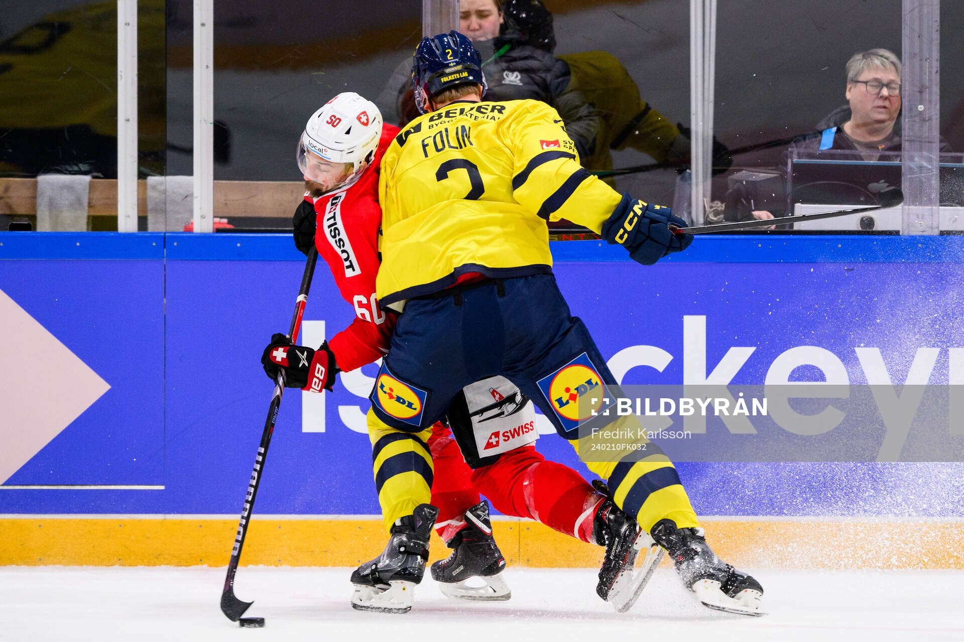 Tristan Scherwey of Switzerland and Christian Folin of