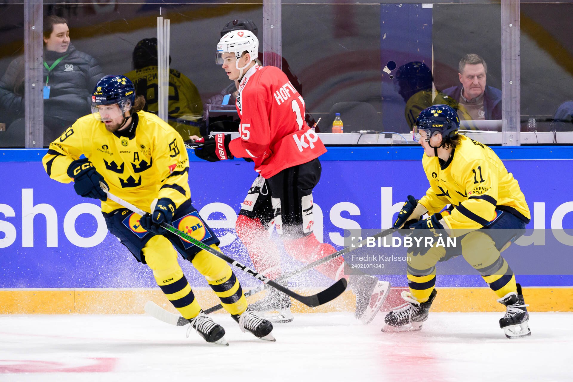 Linus Johansson of Sweden Gregory Hofmann #15, SUI of