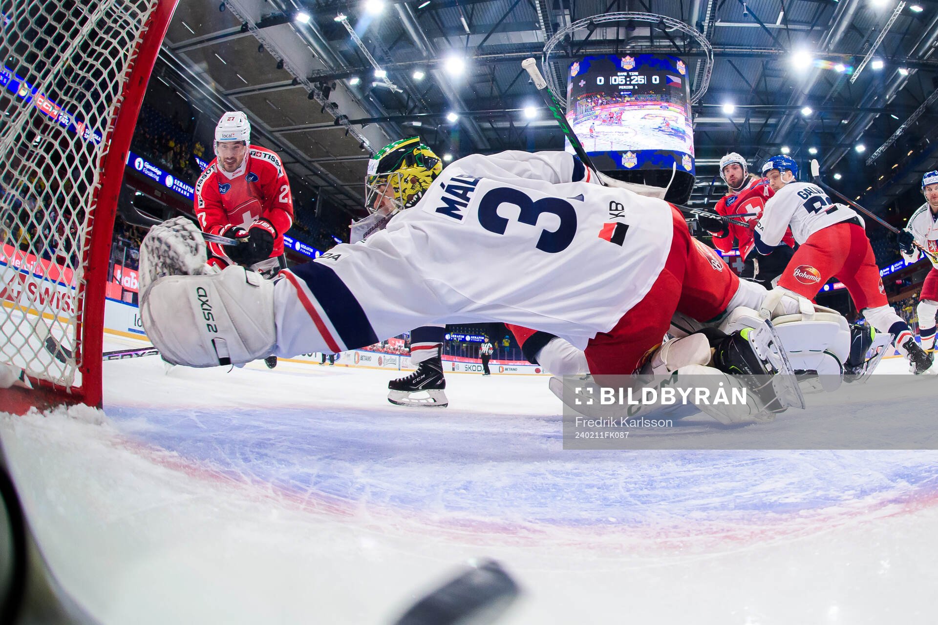 Axel Simic of Switzerland shoots 1-0