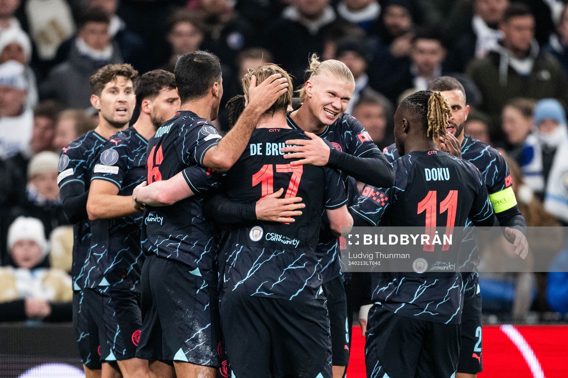 Bernardo Silva of Manchester City celebrates with team mates after 1-2 during the UEFA Champions League football 1/8 final between FC Copenhagen and Manchester City on February 13, 2024 in Copenhaugen.