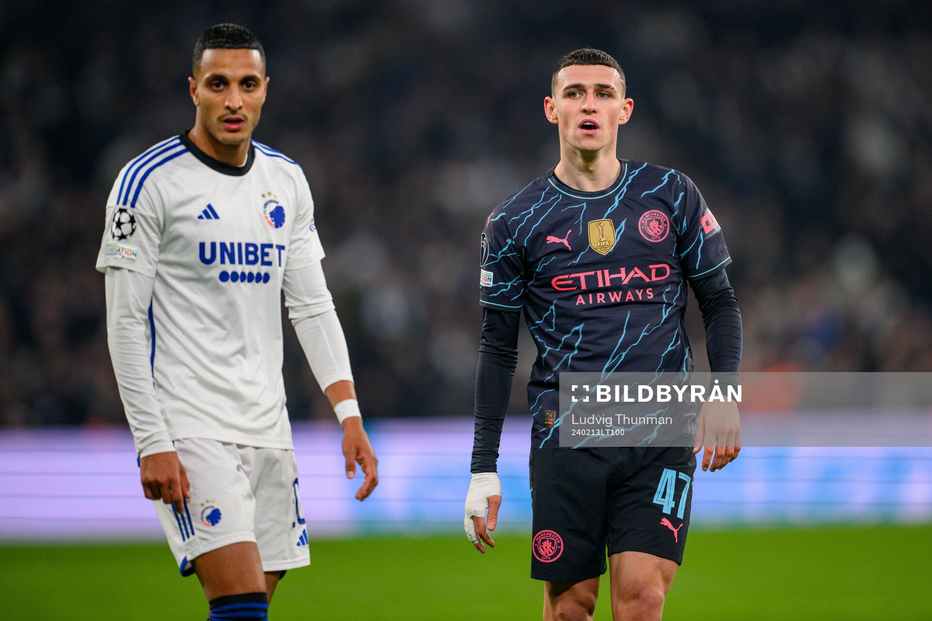 Elias Achouri of FC Copenhagen and Phil Foden of Manchester