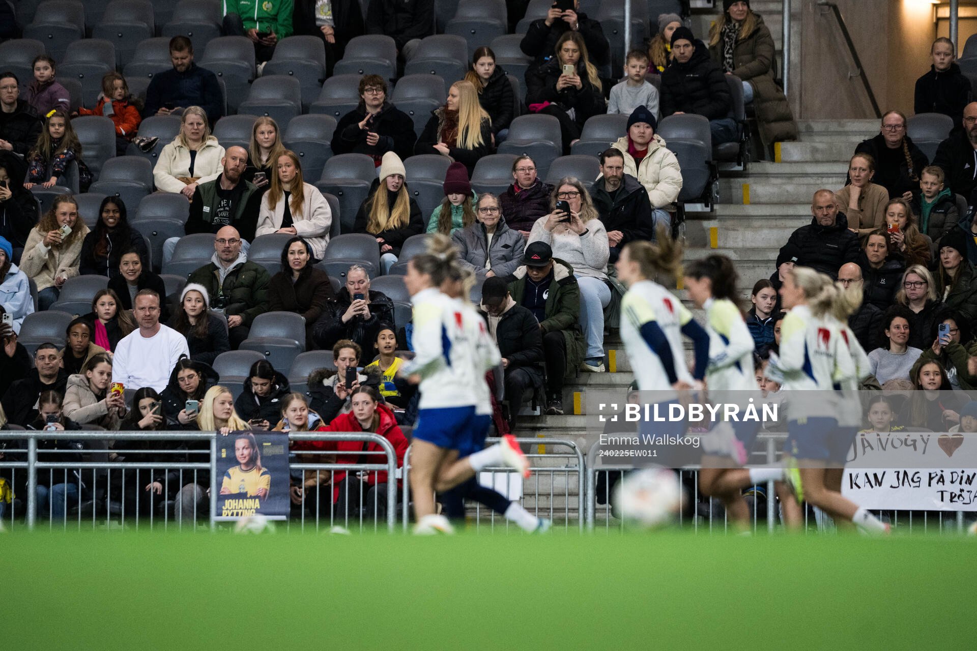 Spectators in the stands at a training session