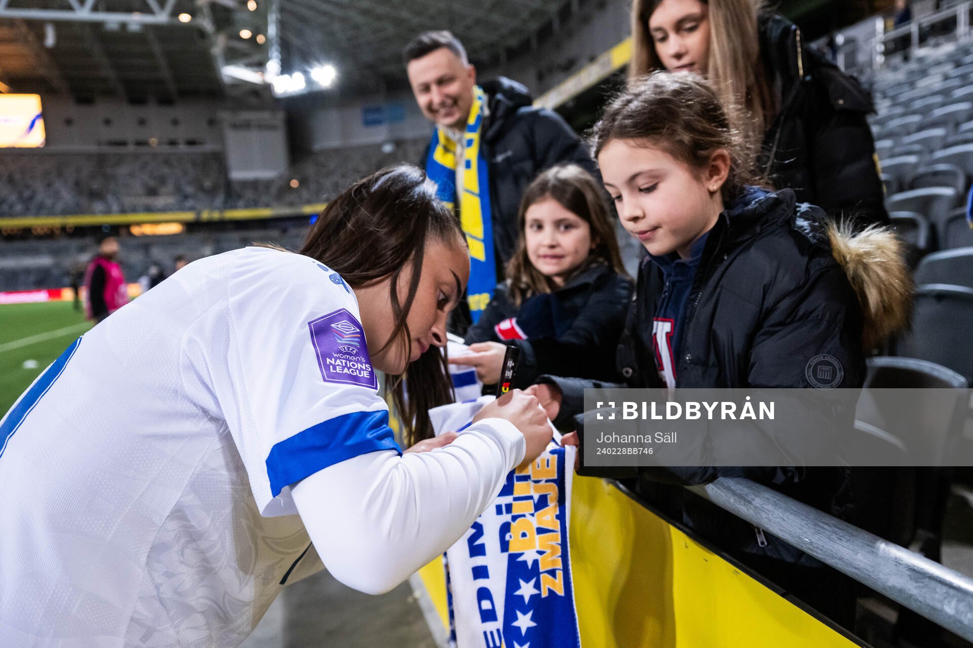 Elma Smajic of Bosnia and Herzegovina signs autographs for
