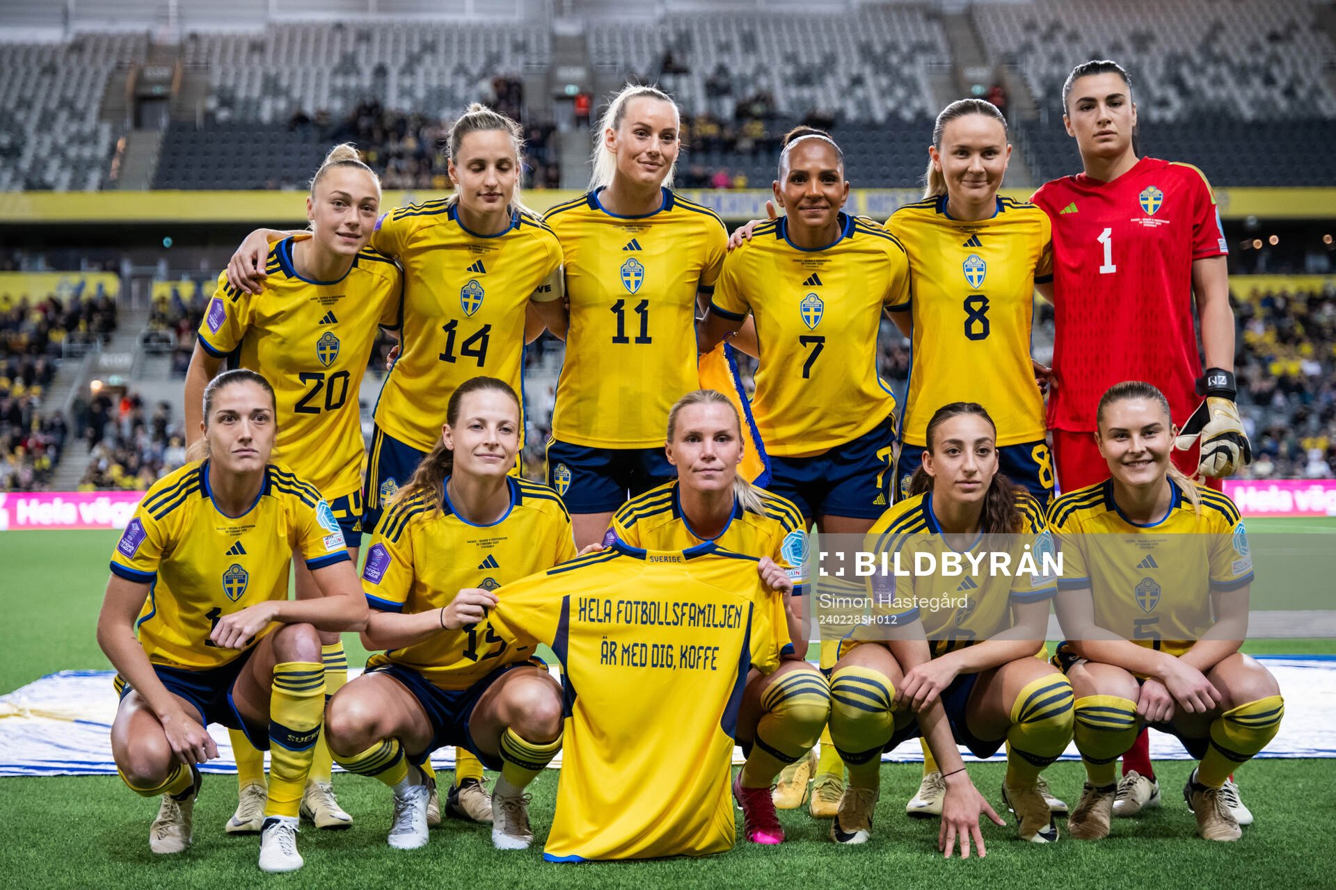 The starting eleven of Sweden pose for a photo as the hold
