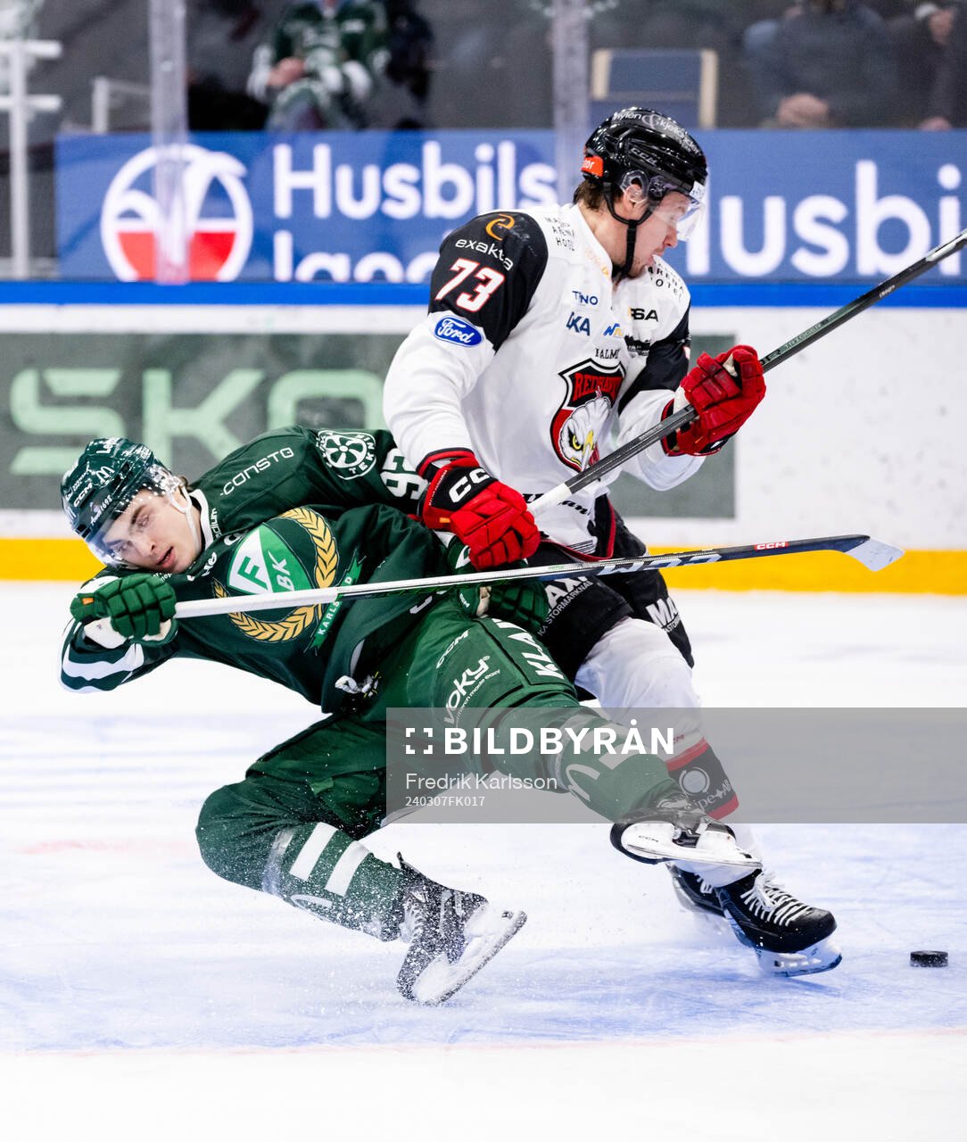 Färjestads Liam Öhgren och Malmö Redhawks Adam Ollas