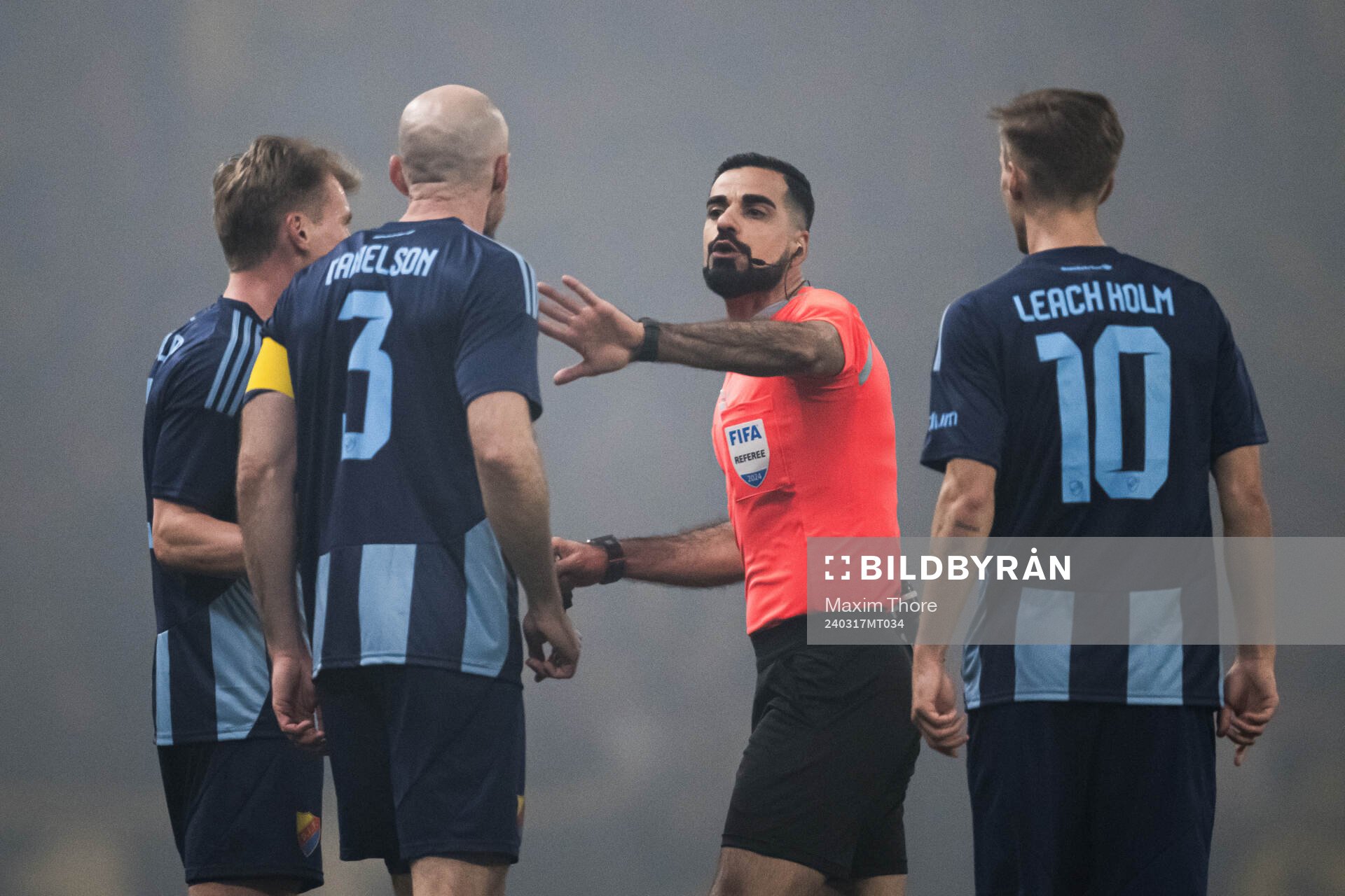 Domare Mohammed Al-Hakim och Djurgårdens Marcus Danielson