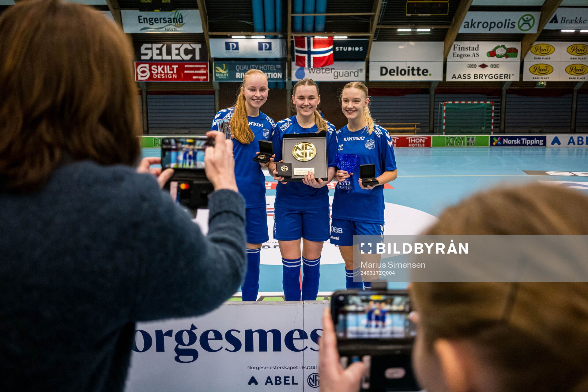 Marie Methi, Vilde Bjørgård Kristiansen and Mari Kristine Vik of Tiller celebrates after the Norwegian Championship futsal match between XXX and XXX on March 17, 2024 in Drammen.