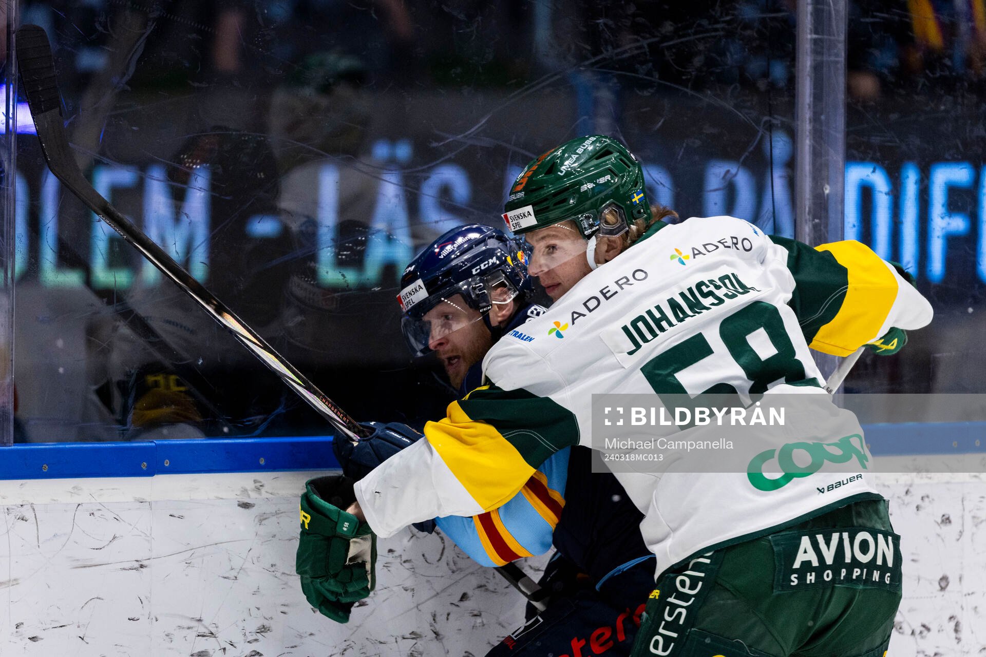 Björklövens Kim Johansson holding på Djurgårdens Linus