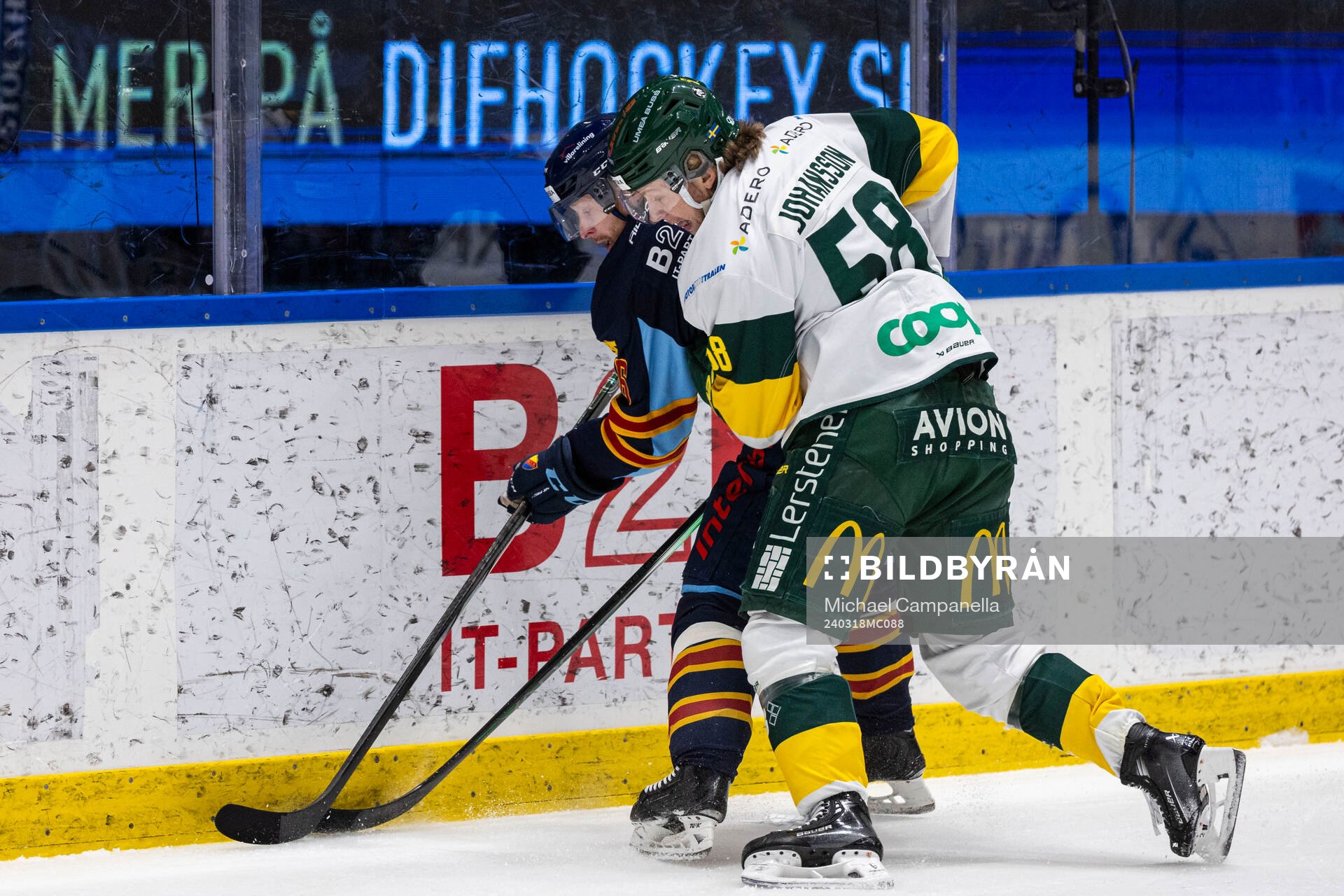 Björklövens Kim Johansson holding på Djurgårdens Linus