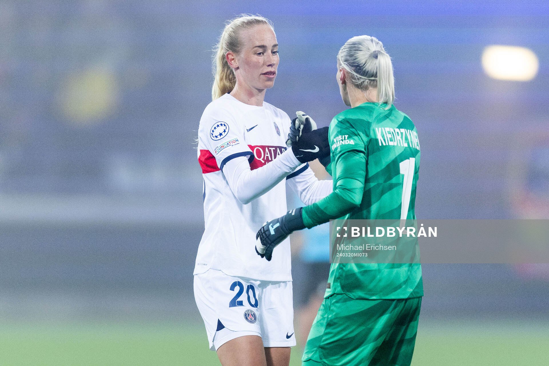 Amalie Vangsgaard of Paris Saint Germain celebrates with goalkeeper Katarzyna Kiedrzynek after the UEFA Women's Champions League quarterfinal between Häcken and Paris Saint Germain on March 20, 2024 in Göteborg.