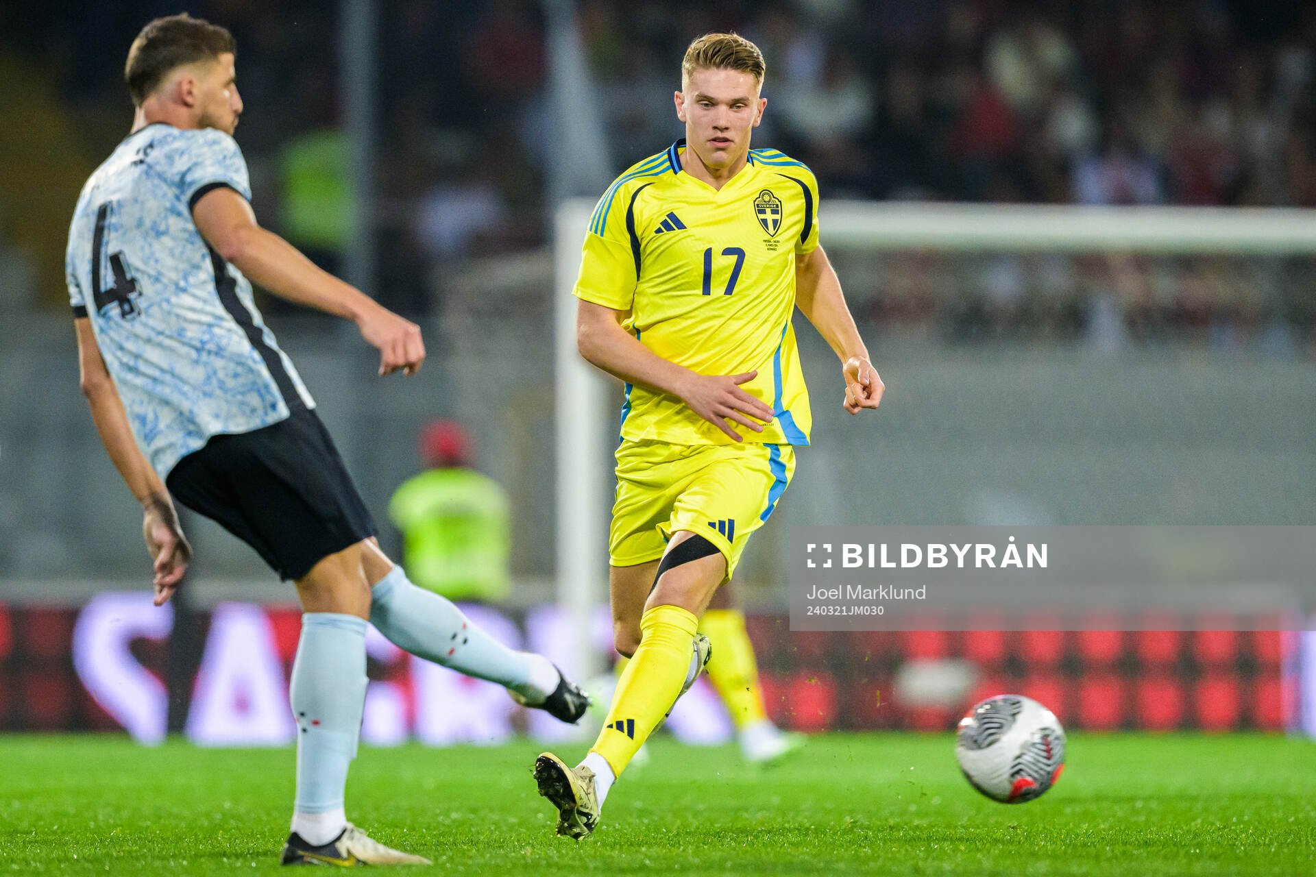 Ruben Dias of Portugal and Viktor Gyökeres of Sweden