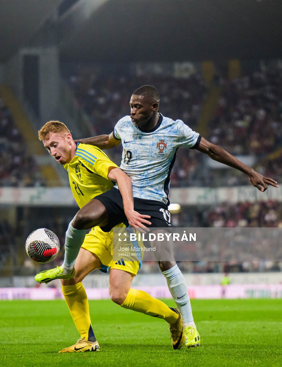 Dejan Kulusevski of Sweden and Nuno Mendes of Portugal
