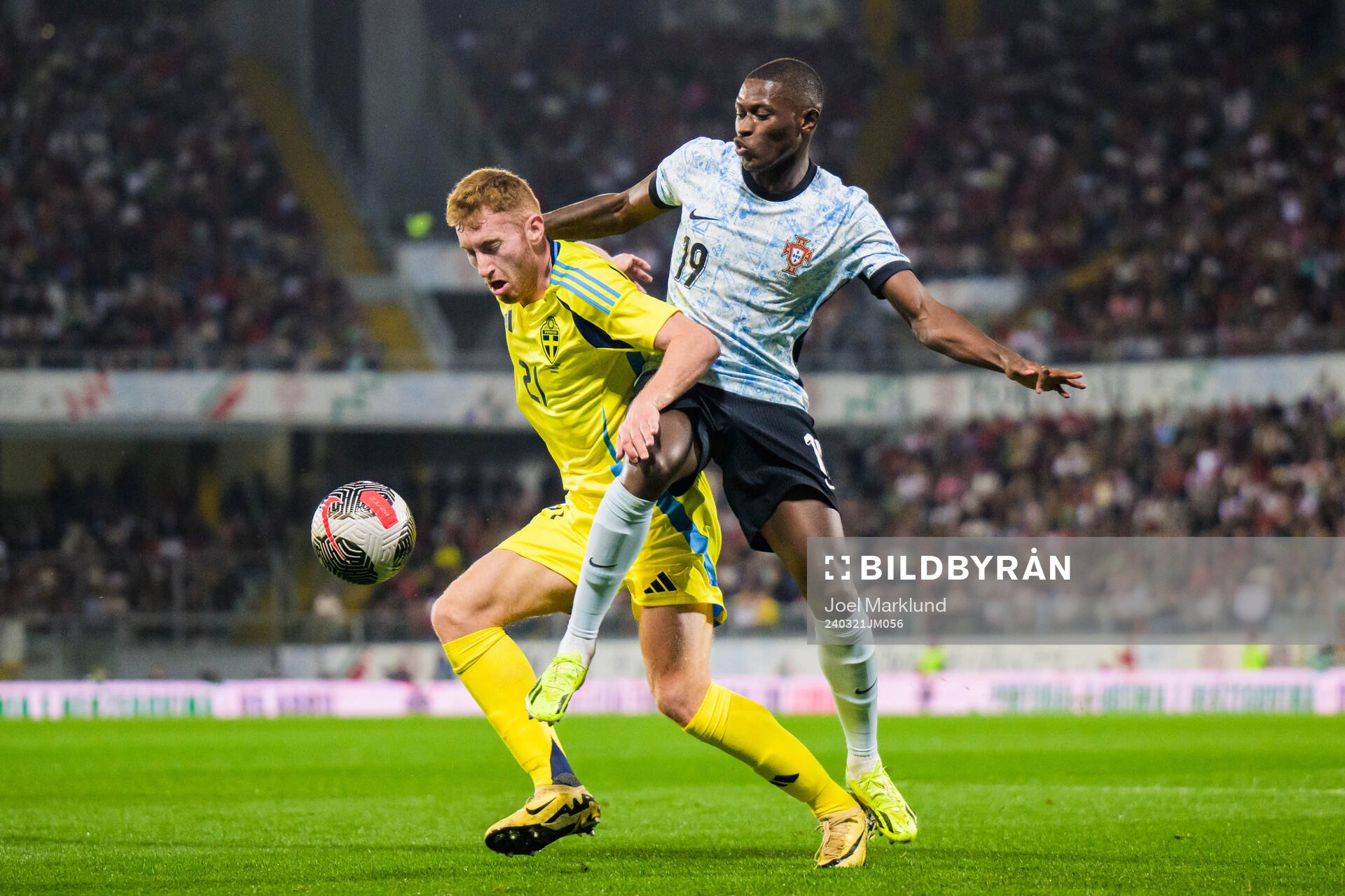 Dejan Kulusevski of Sweden and Nuno Mendes of Portugal