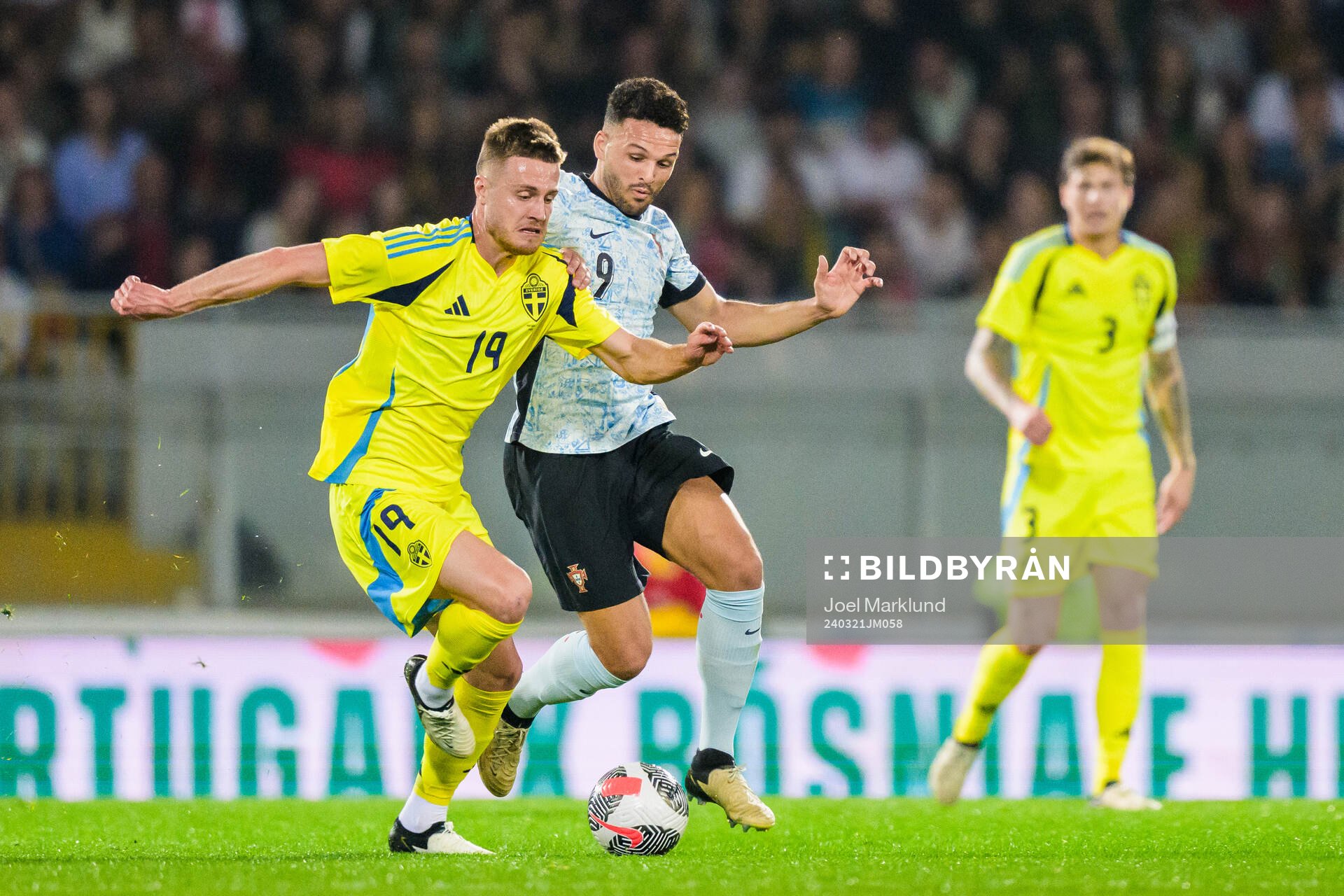 Mattias Svanberg of Sweden and Goncalo Ramos of Portugal