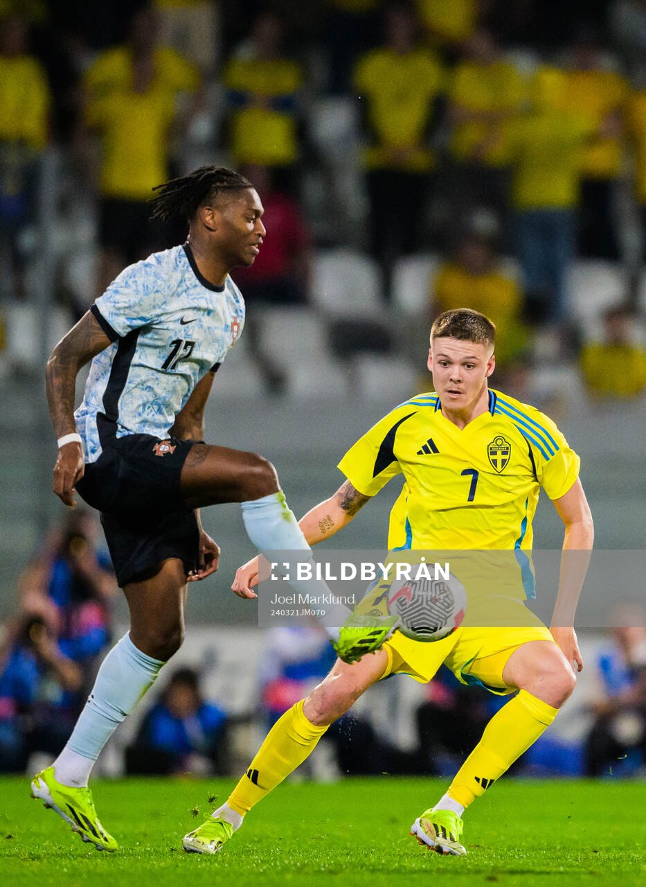 Rafael Leao of Portugal and Emil Holm of Sweden