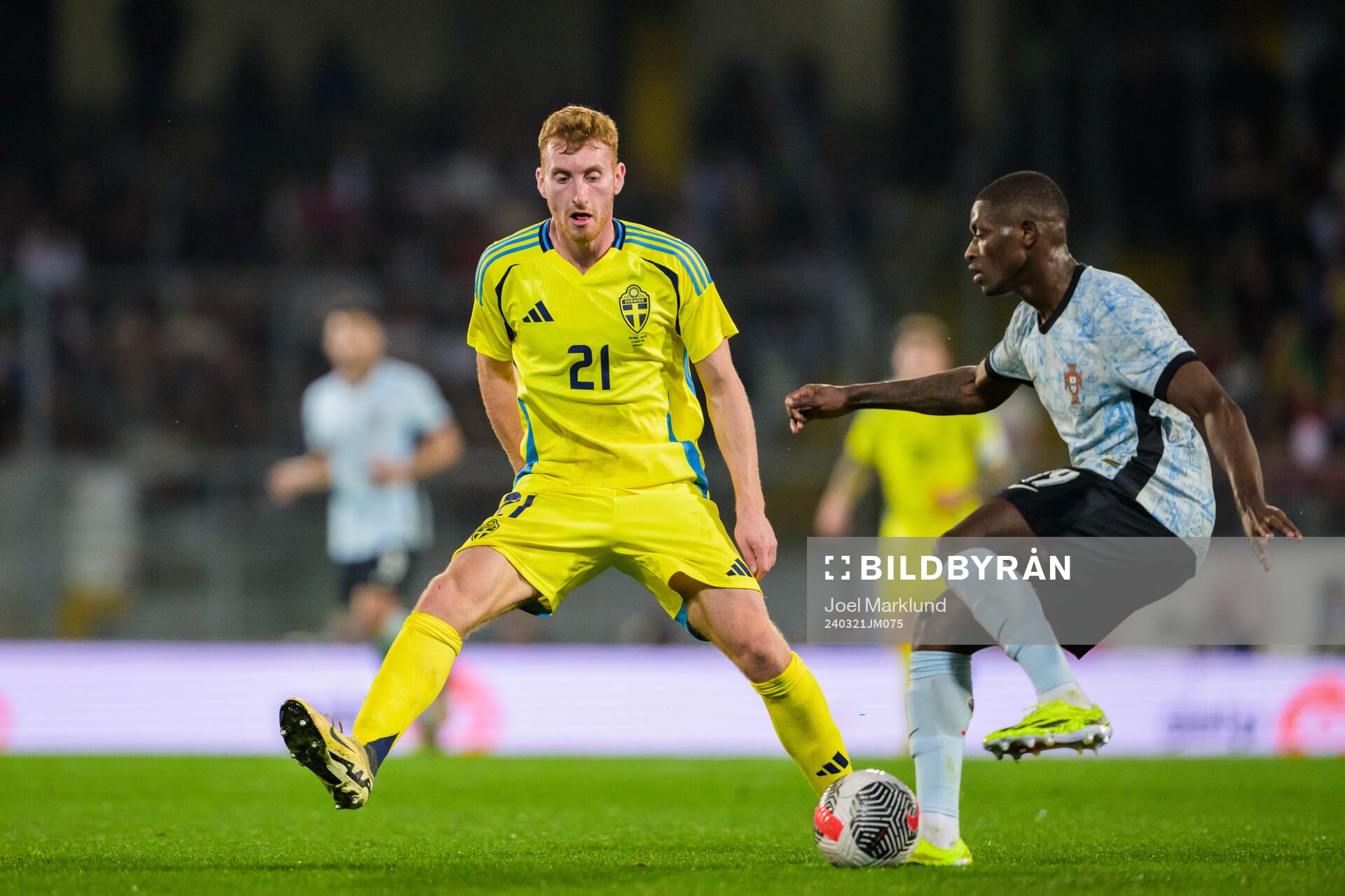 Dejan Kulusevski of Sweden and Nuno Mendes of Portugal