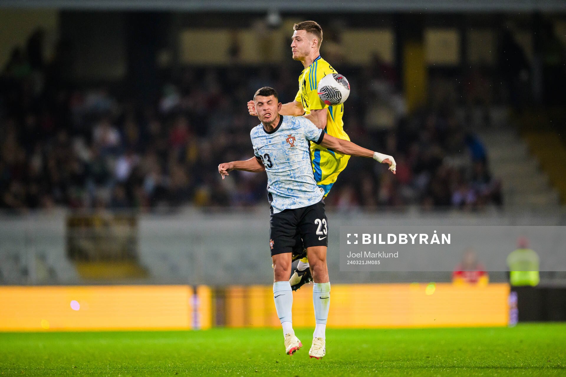Matheus Nunes of Portugal and Mattias Svanberg of Sweden