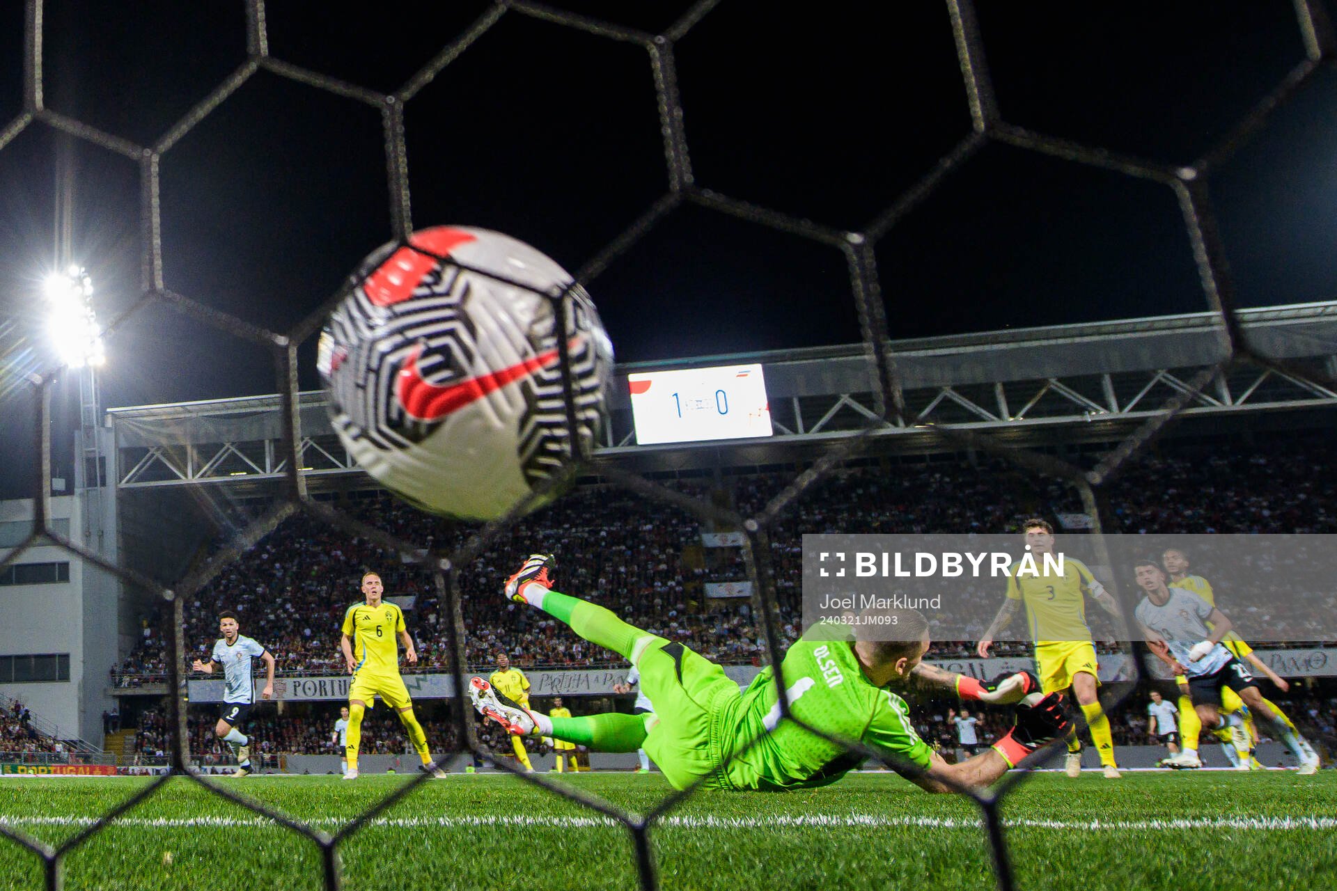 Matheus Nunes of Portugal scores 2-0 behind goalkeeper