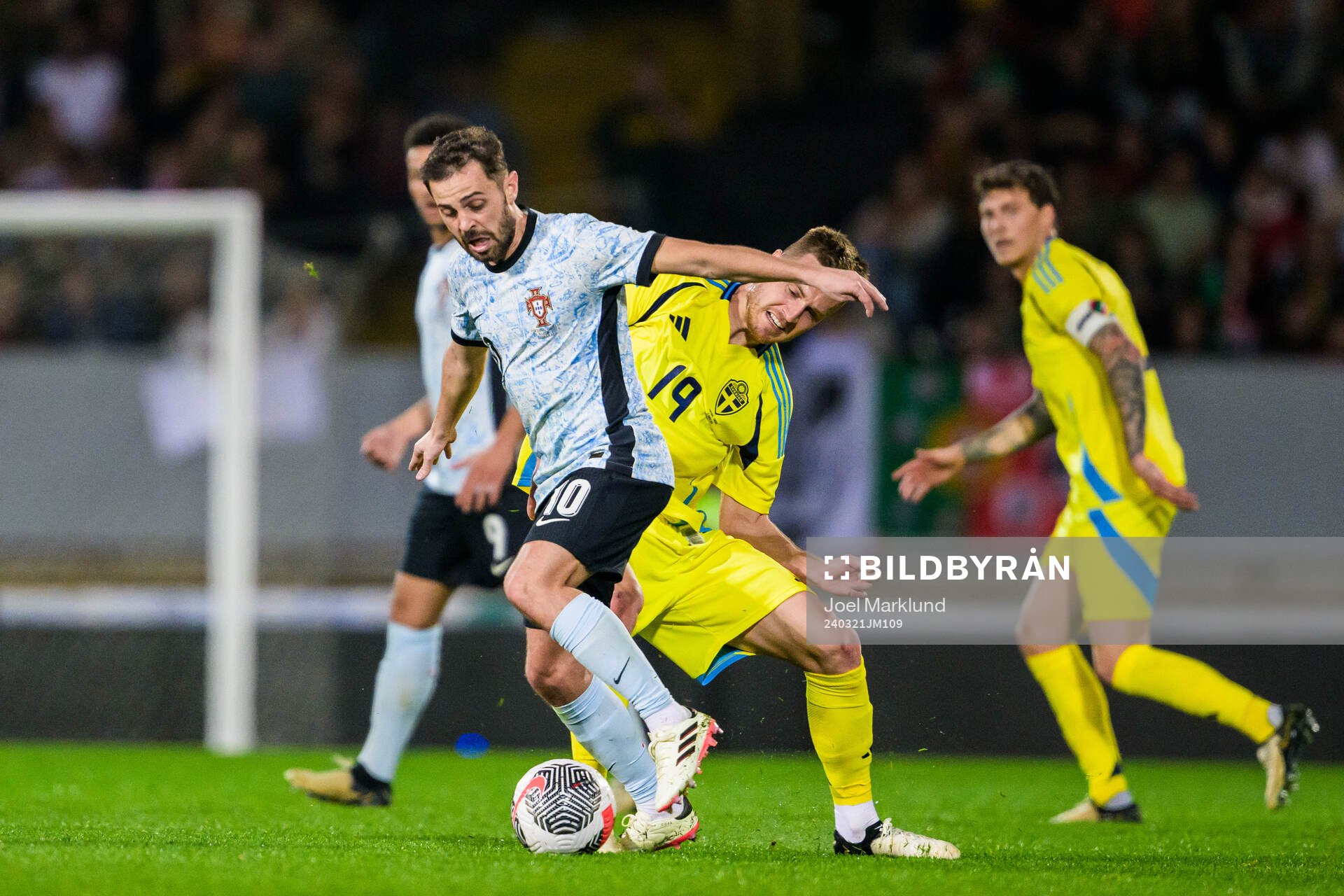 Bernardo Silva of Portugal and Mattias Svanberg of Sweden