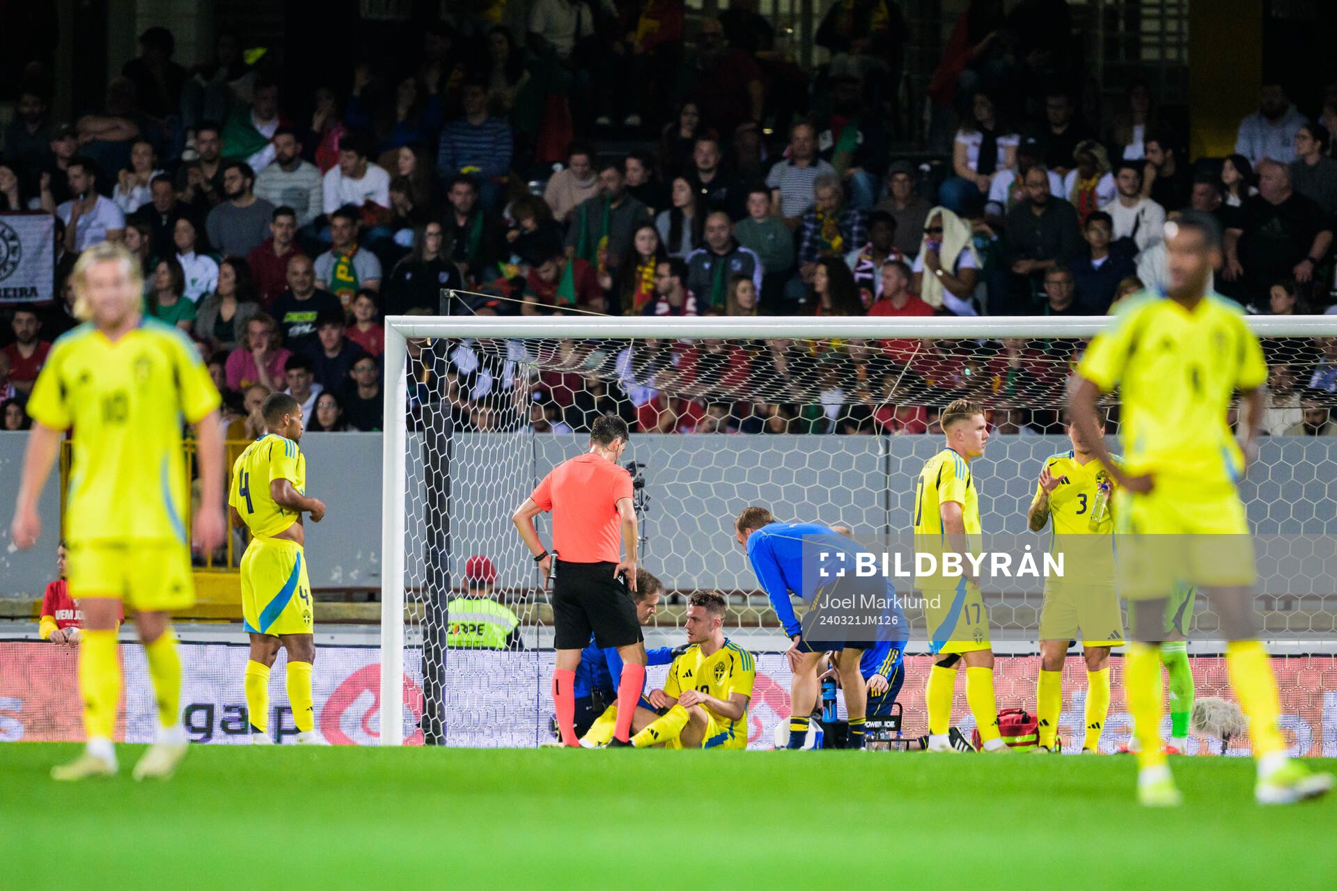 Mattias Svanberg of Sweden receives medical attention