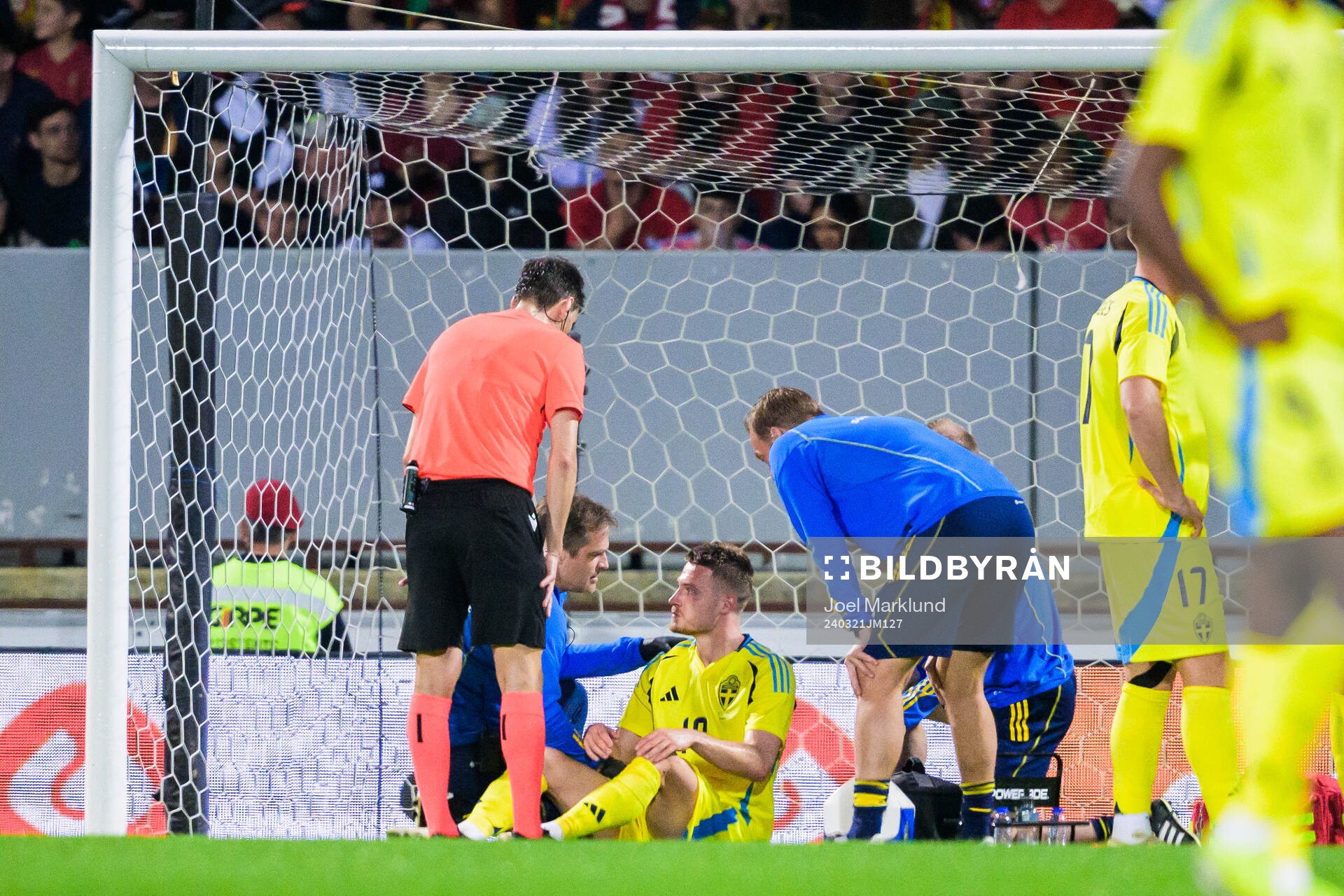 Mattias Svanberg of Sweden receives medical attention