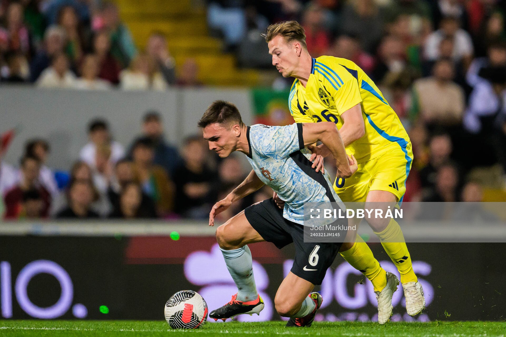 Joao Palhinha of Portugal and Simon Olsson of Sweden
