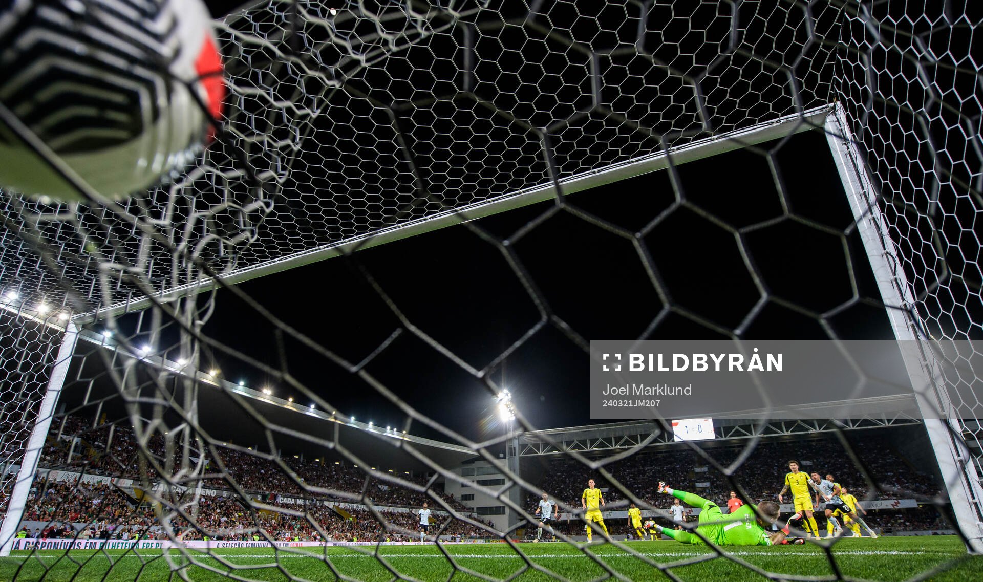 Matheus Nunes of Portugal scores 2-0 behind goalkeeper