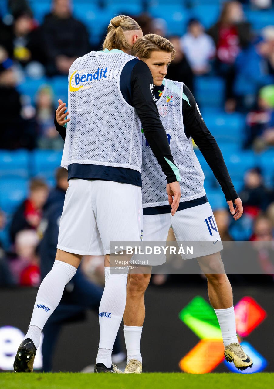 Erling Braut Haaland and Martin Ødegaard of Norway warm up