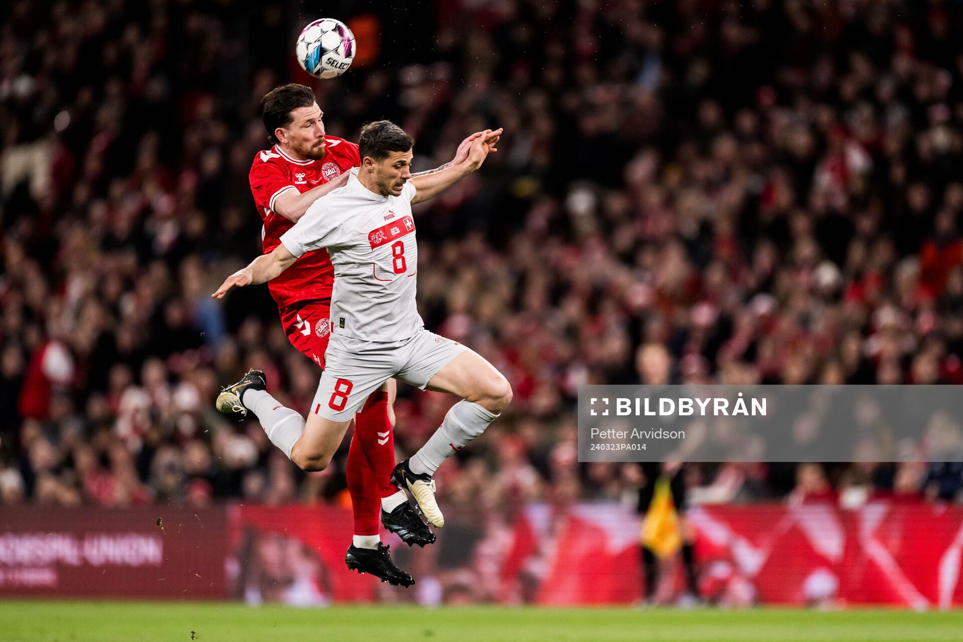 Pierre-Emilie Højbjerg of Denmark and Remo Freuler of Switzerland during the international friendly football match between Denmark and Switzerland on March 23, 2024 in Copenhagen.