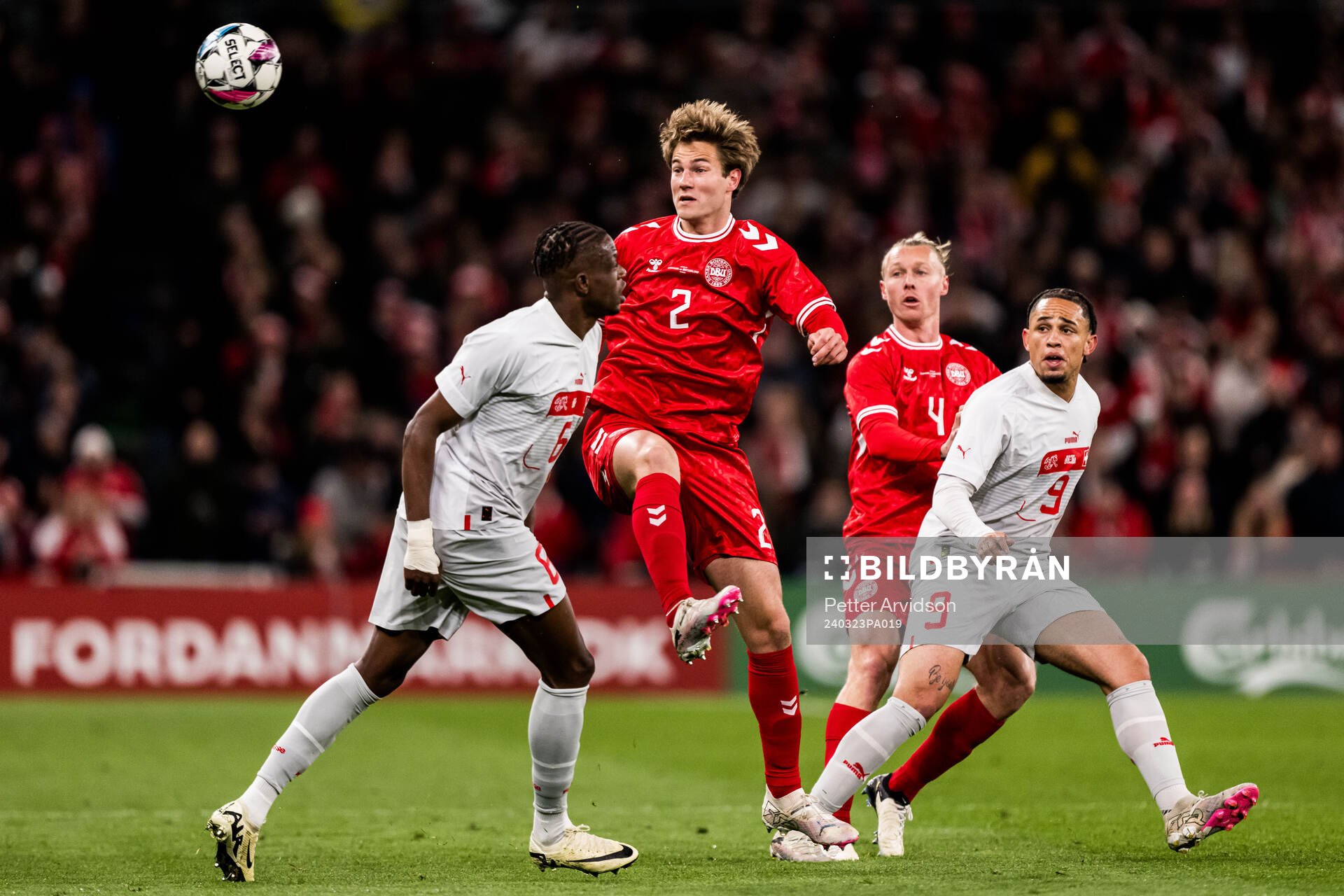 Joachim Andersen and Simon Kjær of Denmark and Danis