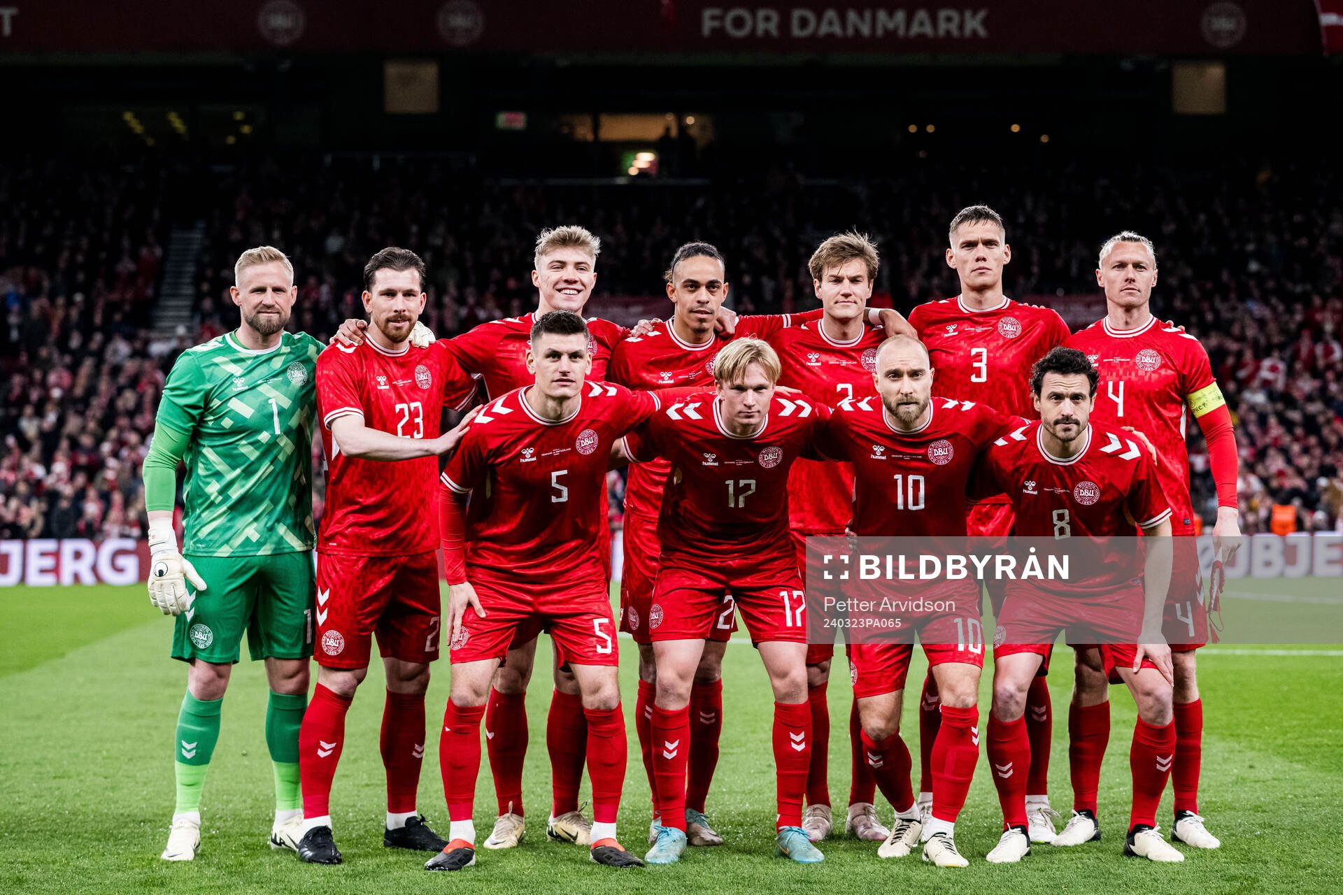 The starting eleven of Denmark pose for a photo