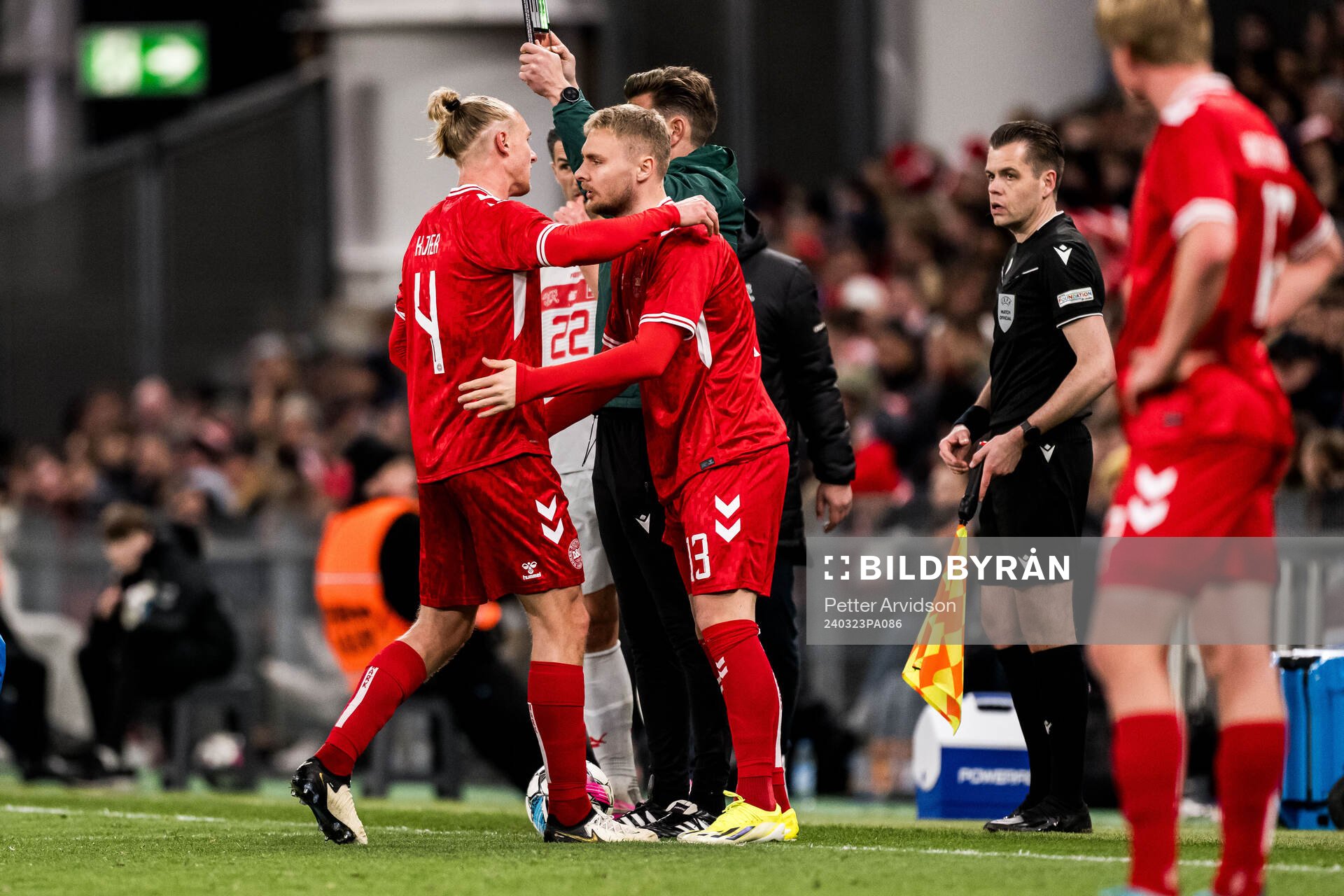 Simon Kjær and Victor Nelsson of Denmark