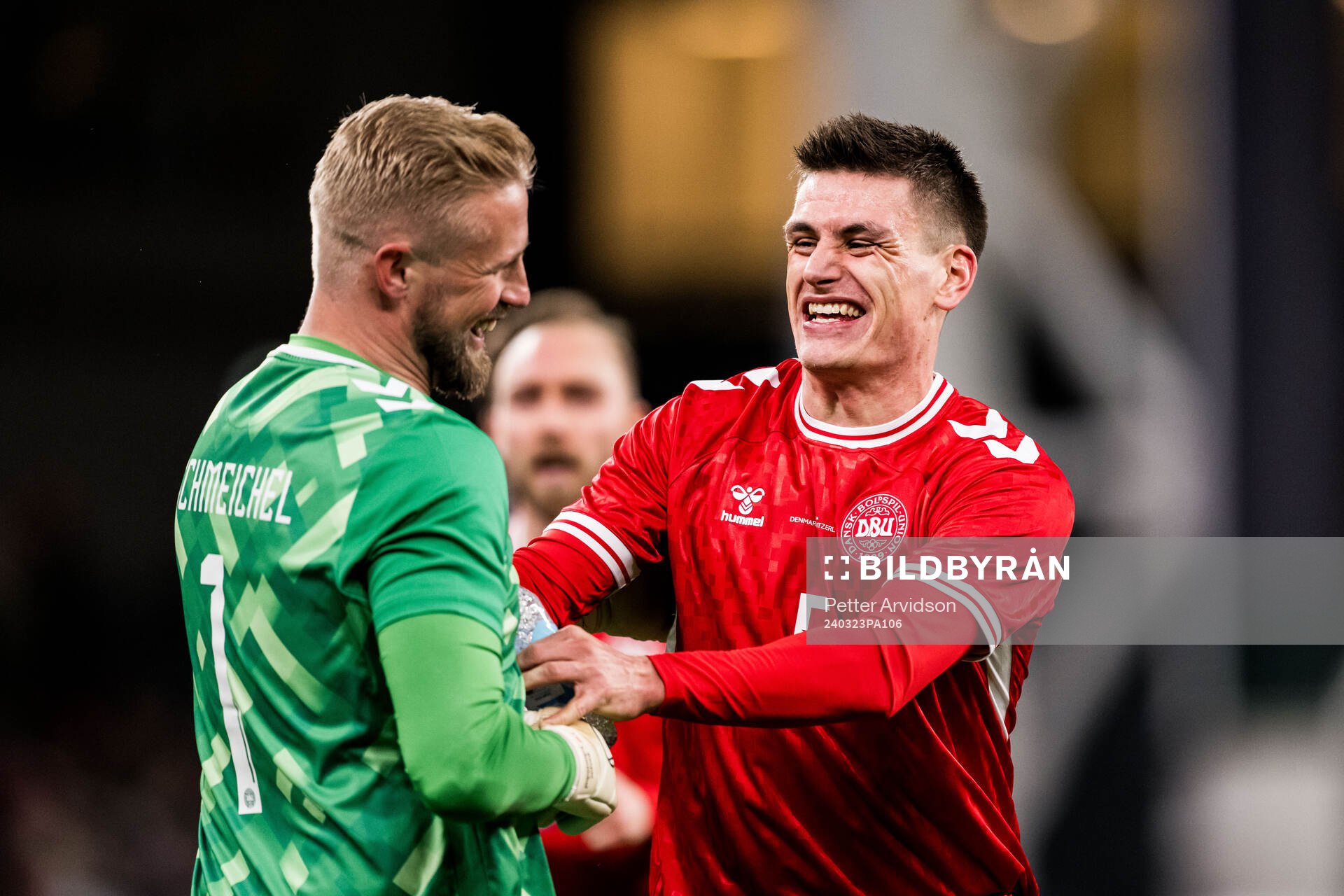 Goalkeeper Kasper Schmeichel and Joakim Mæhle of Denmark
