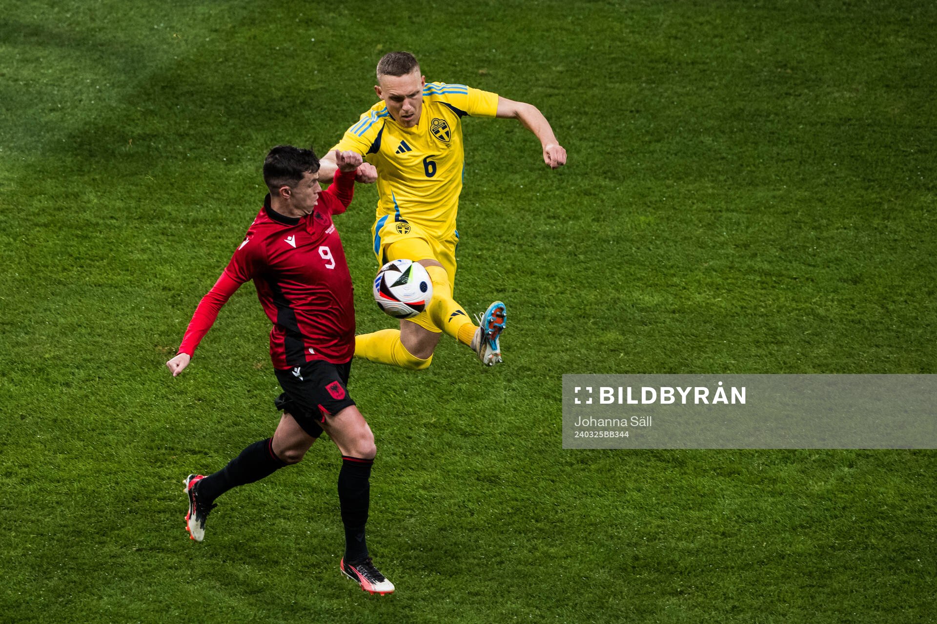 Jasir Asani of Albania and Ludwig Augustinsson of Sweden during the international friendly football match between Sweden and Albania on March 25, 2024 in Stockholm.