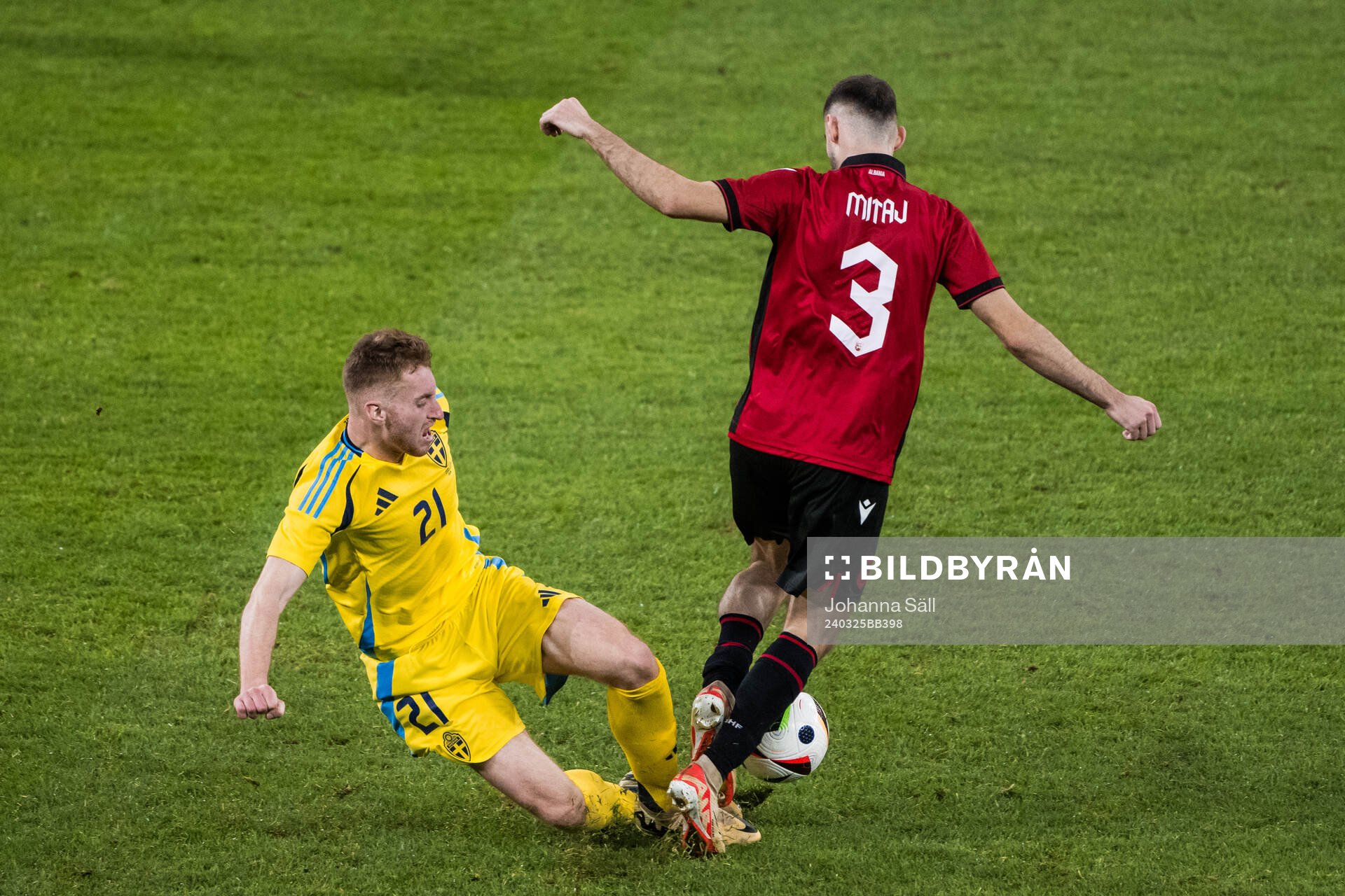 Dejan Kulusevski of Sweden and Mario Mitaj of Albania
