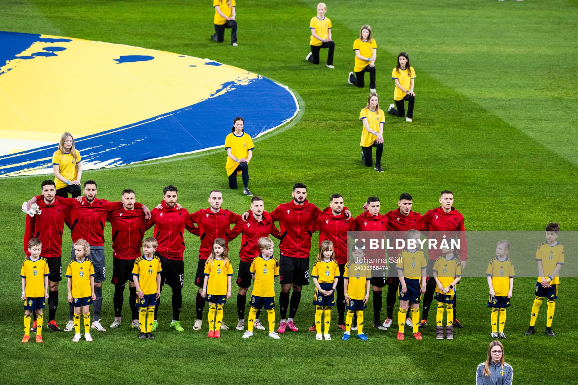 Players of Albania with mascots