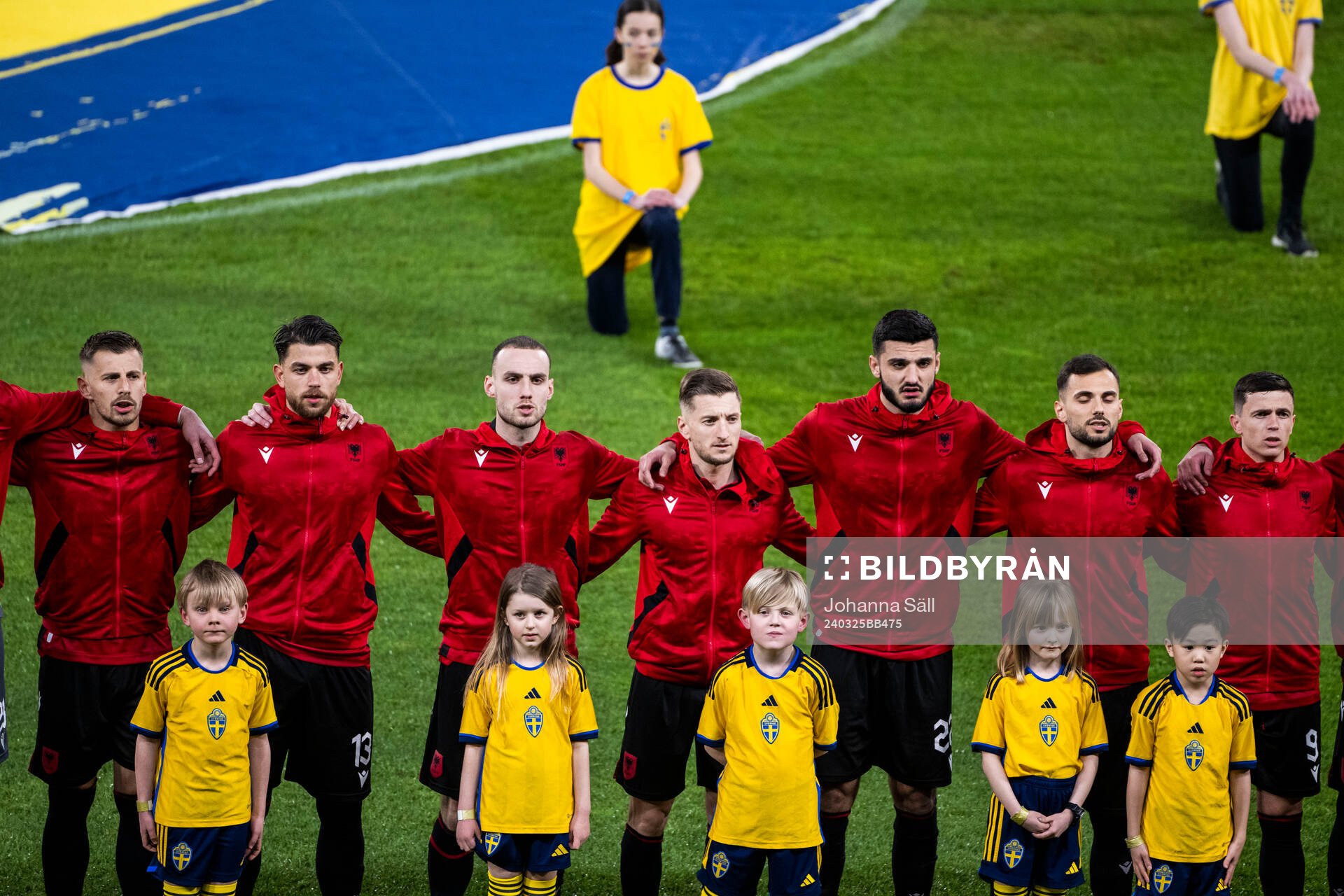 Players of Albania with mascots