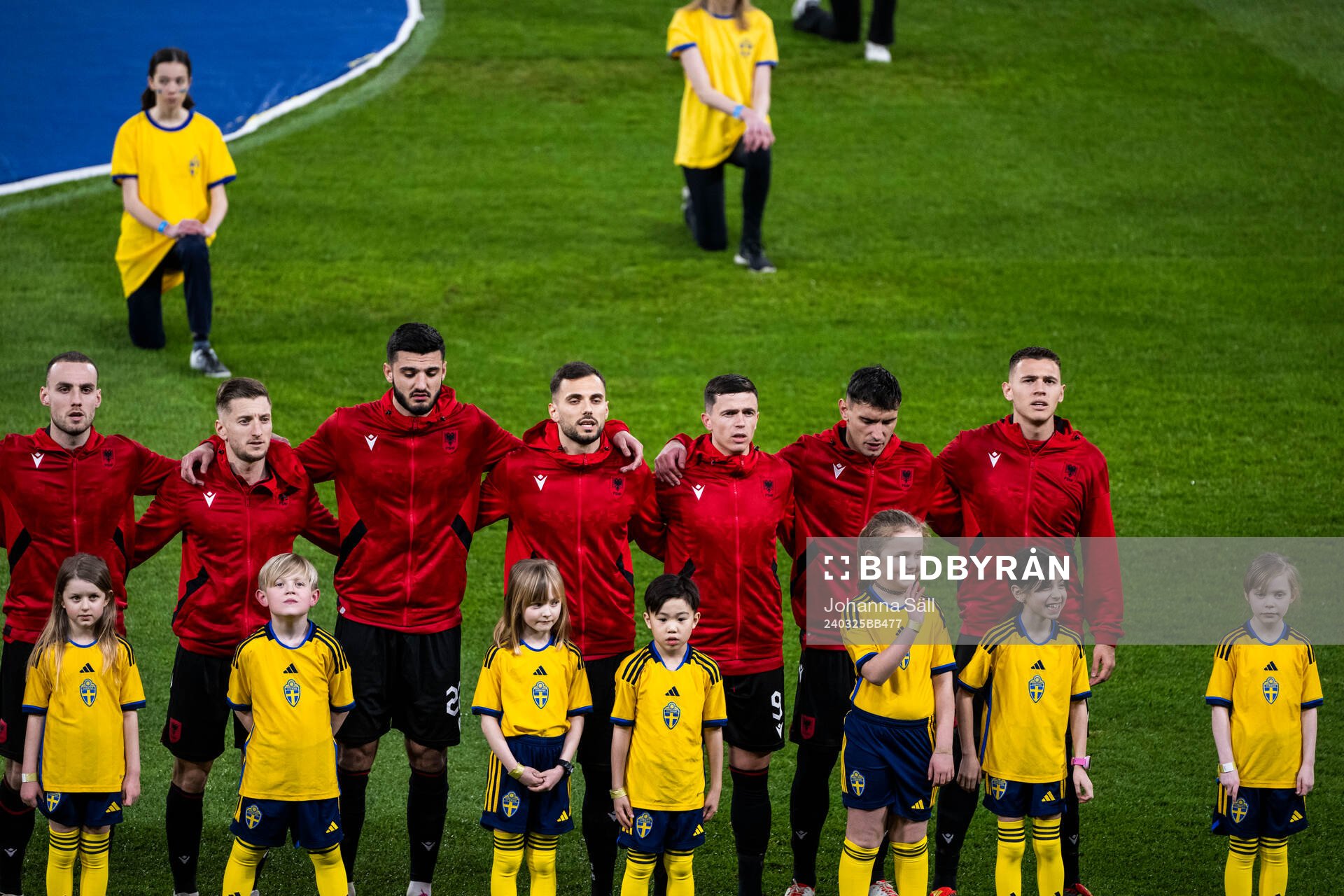 Players of Albania with mascots
