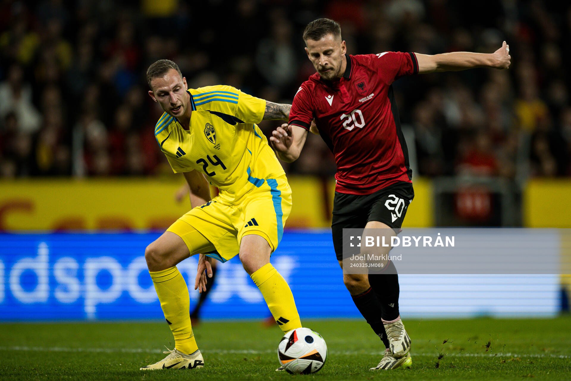 Gustaf Nilsson of Sweden and Ylber Ramadani of Albania during the international friendly football match between Sweden and Albania on March 25, 2024 in Stockholm. 