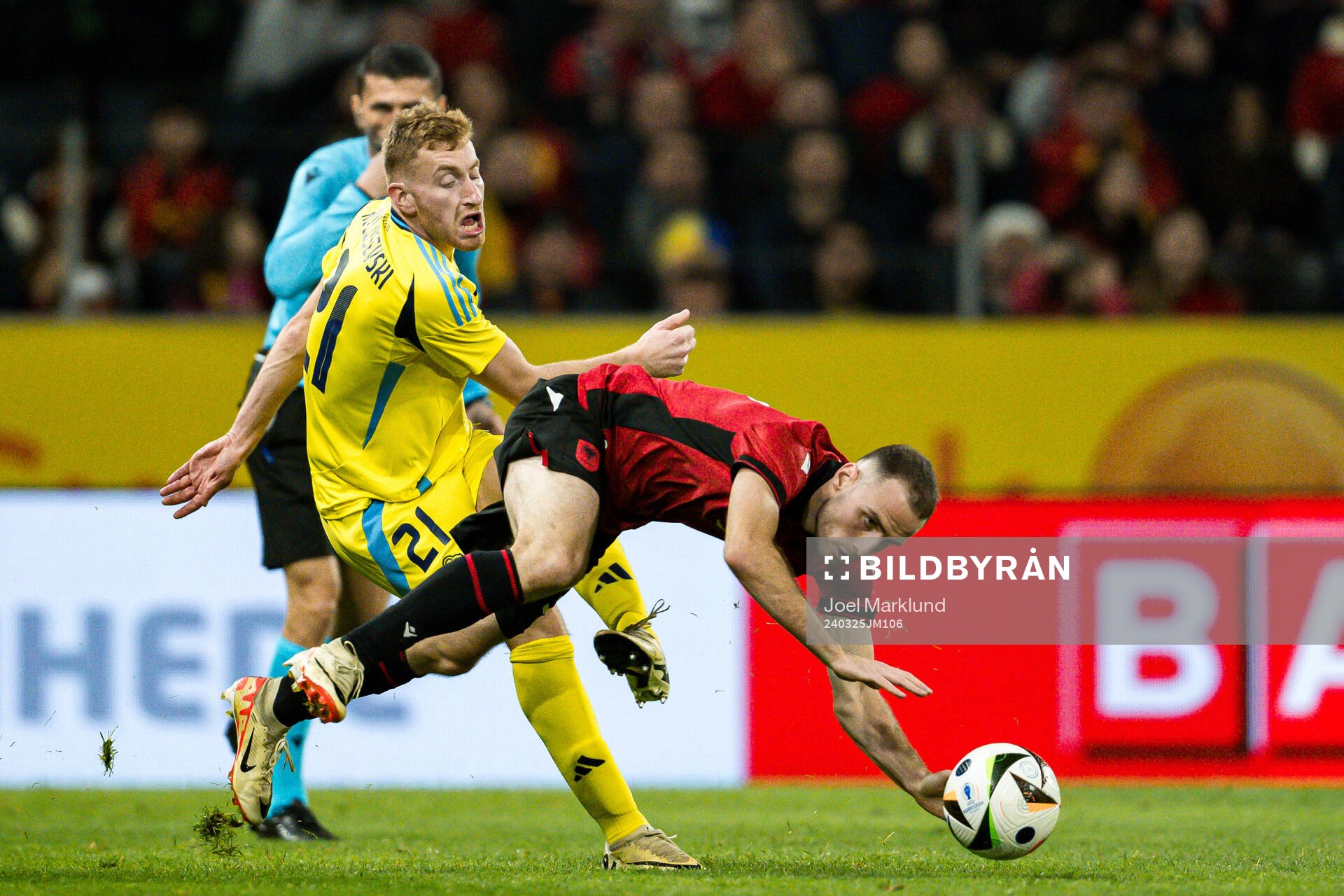 Dejan Kulusevski of Sweden and Mario Mitaj of Albania